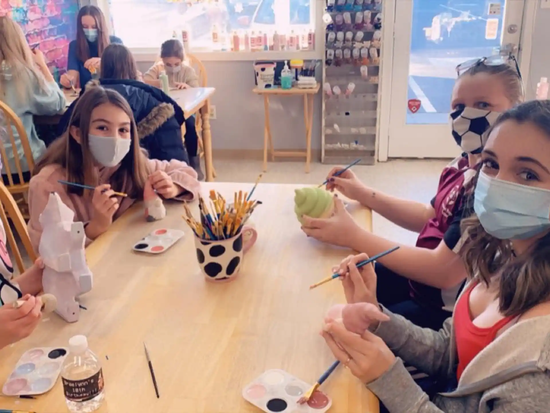 a group of people wearing masks