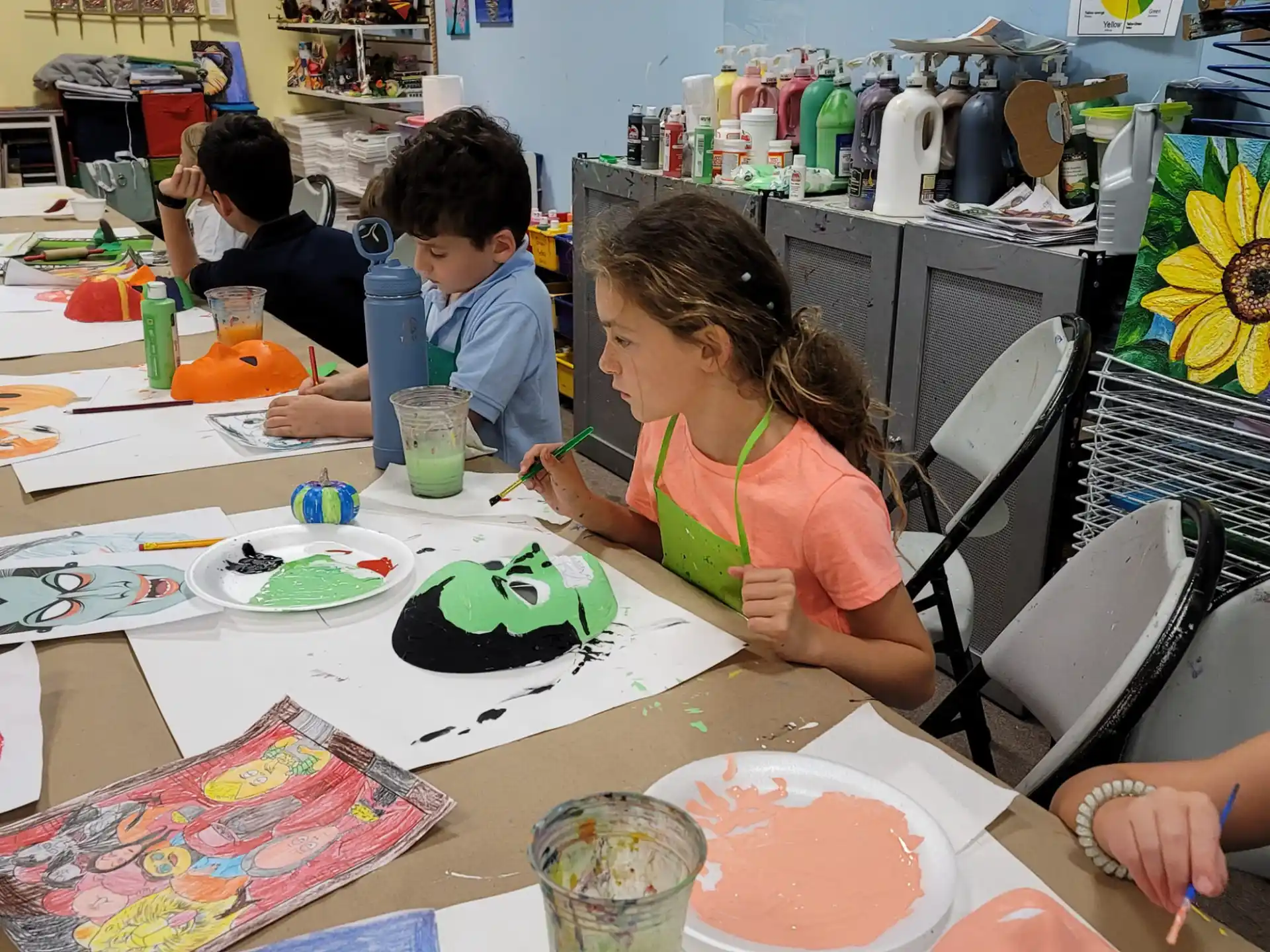 a group of people painting