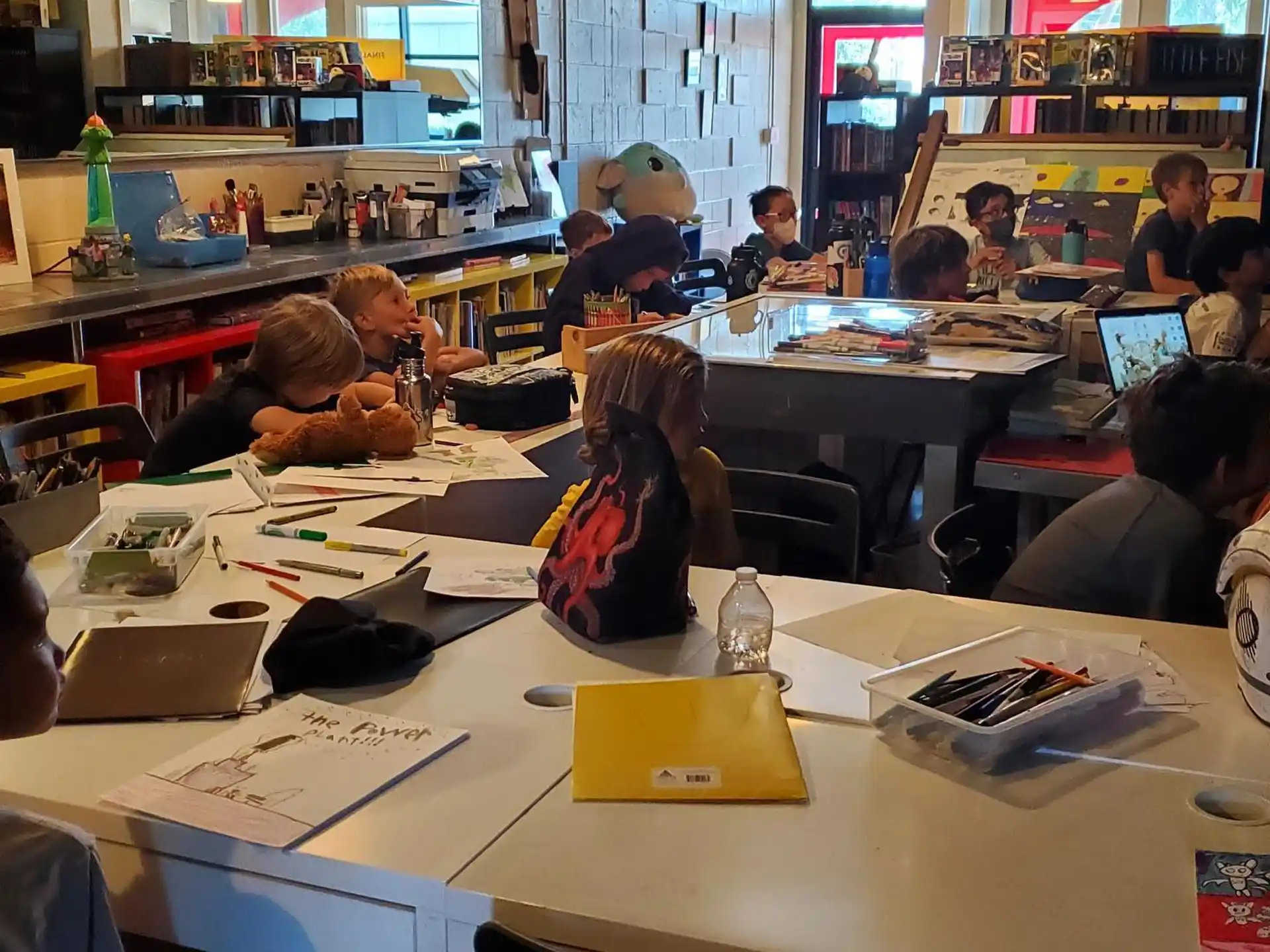 a group of people sitting at tables