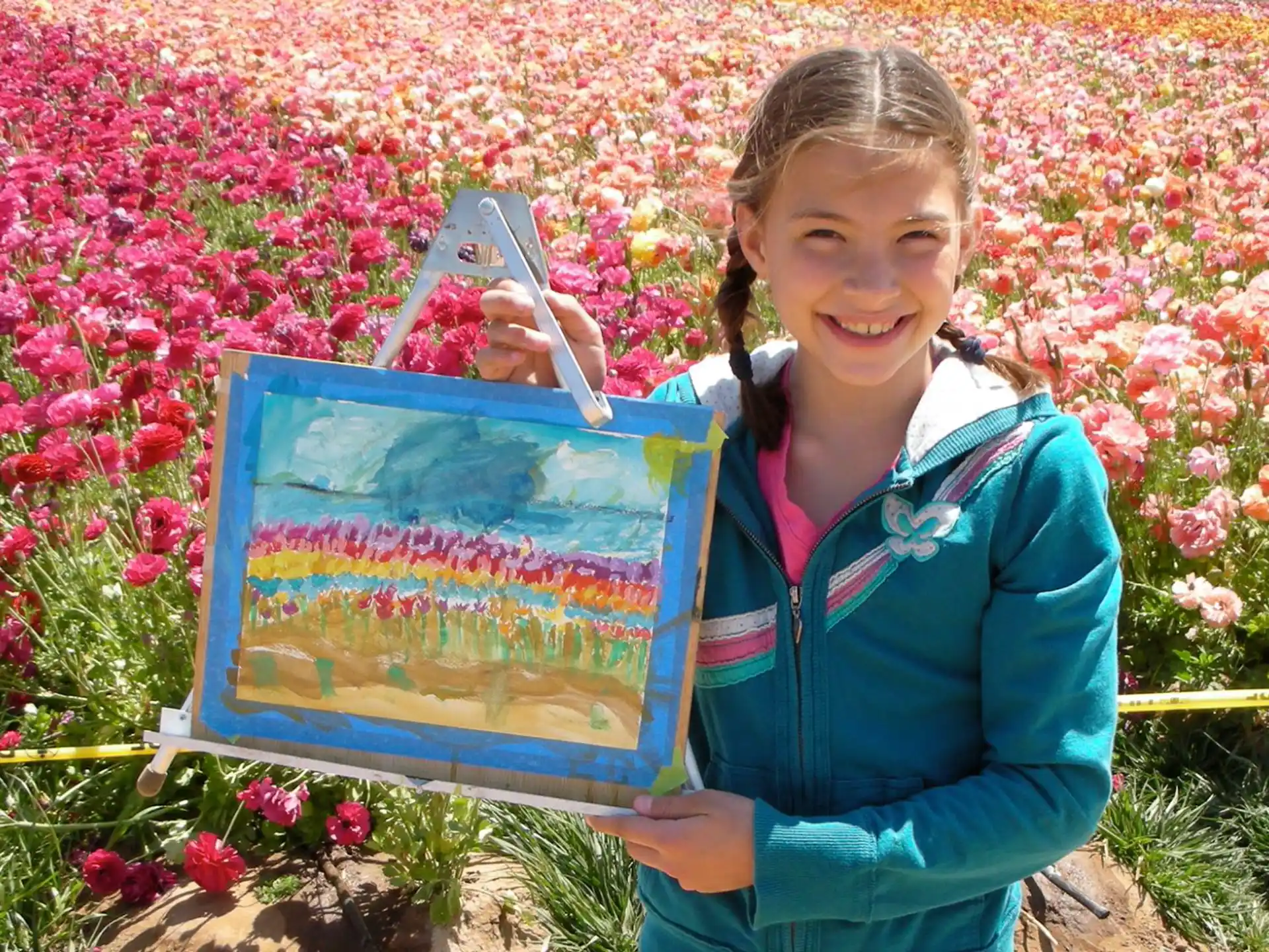 a girl holding a box