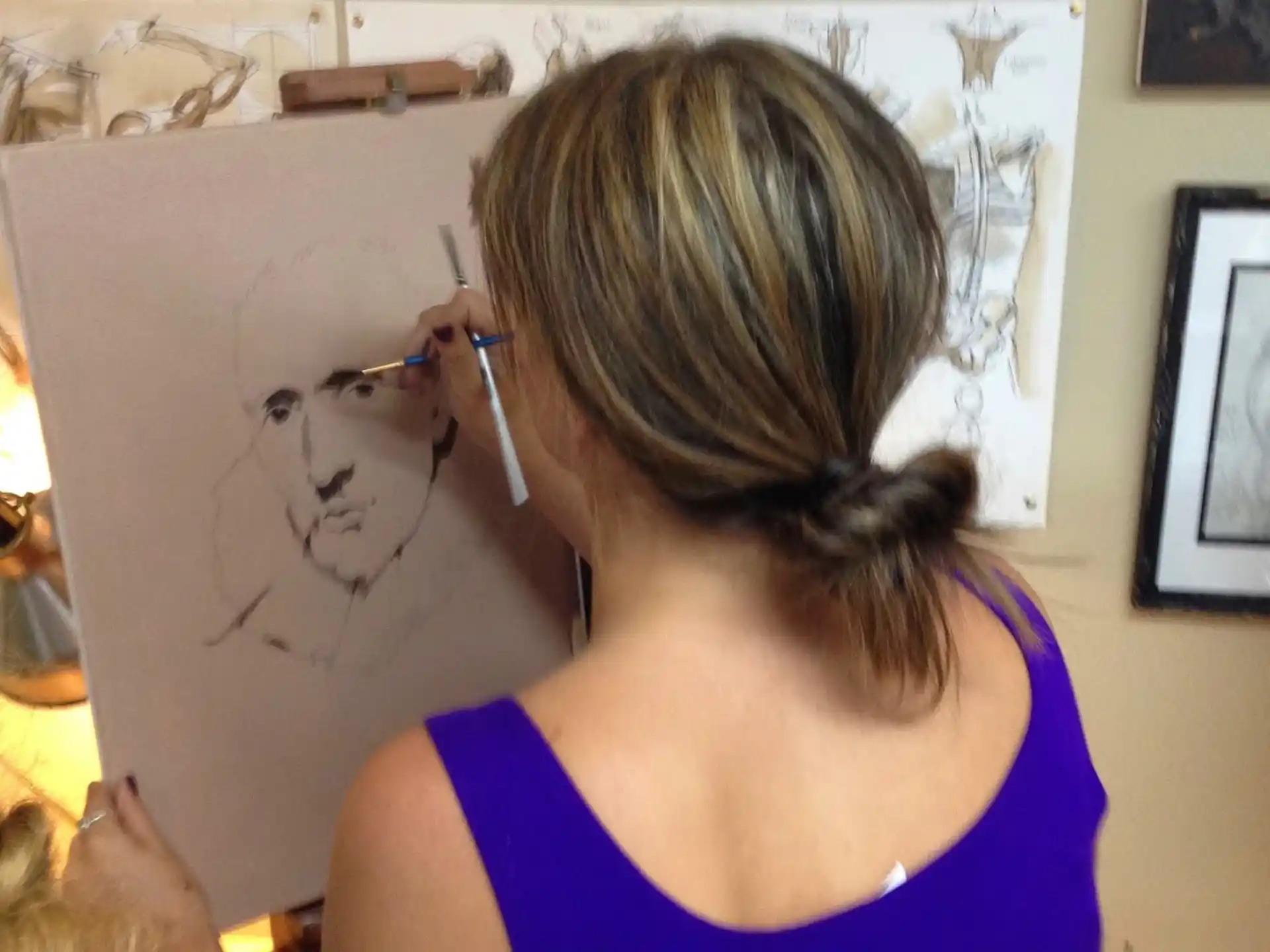 a person drawing a picture