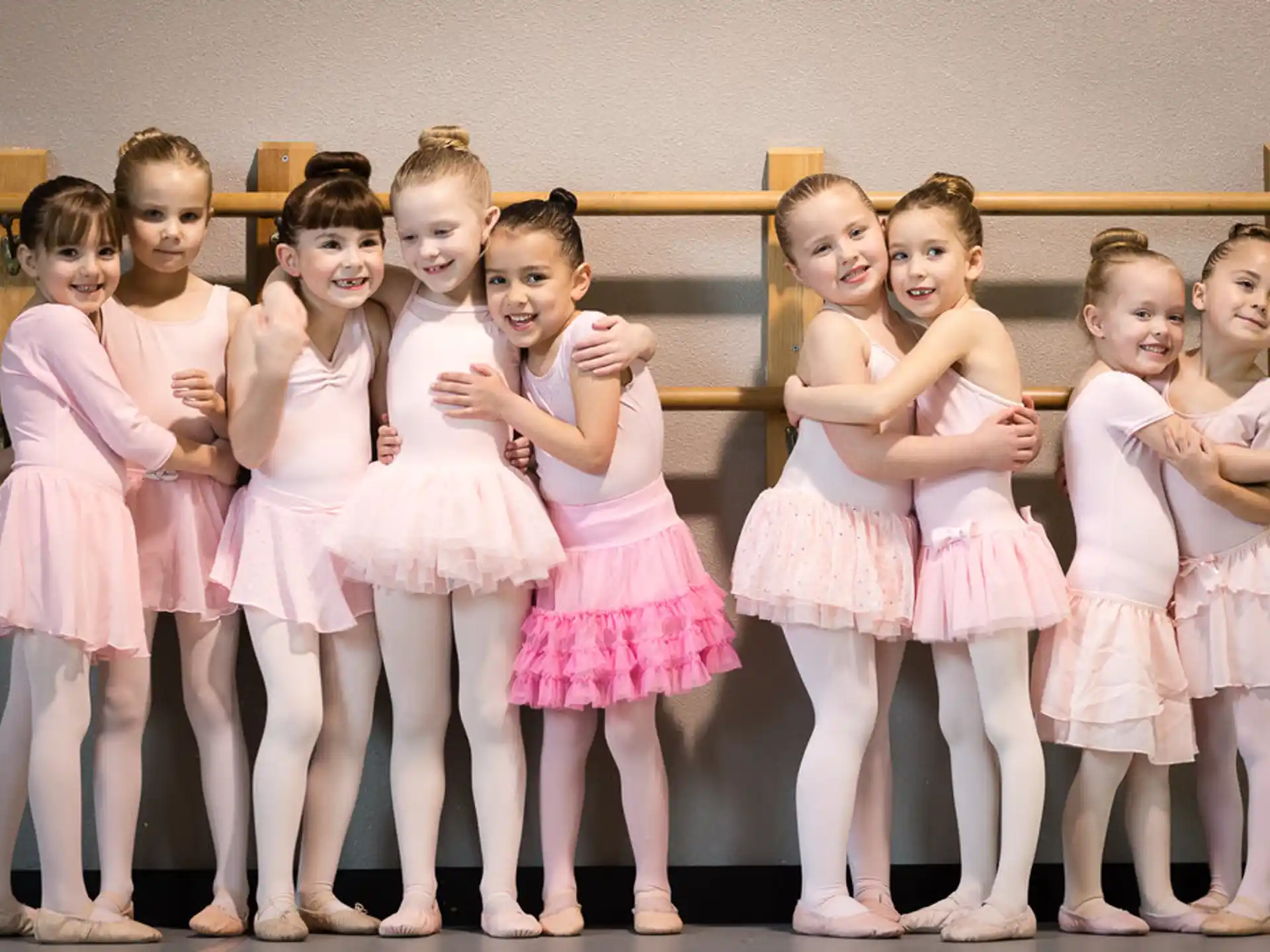 a group of girls in dresses