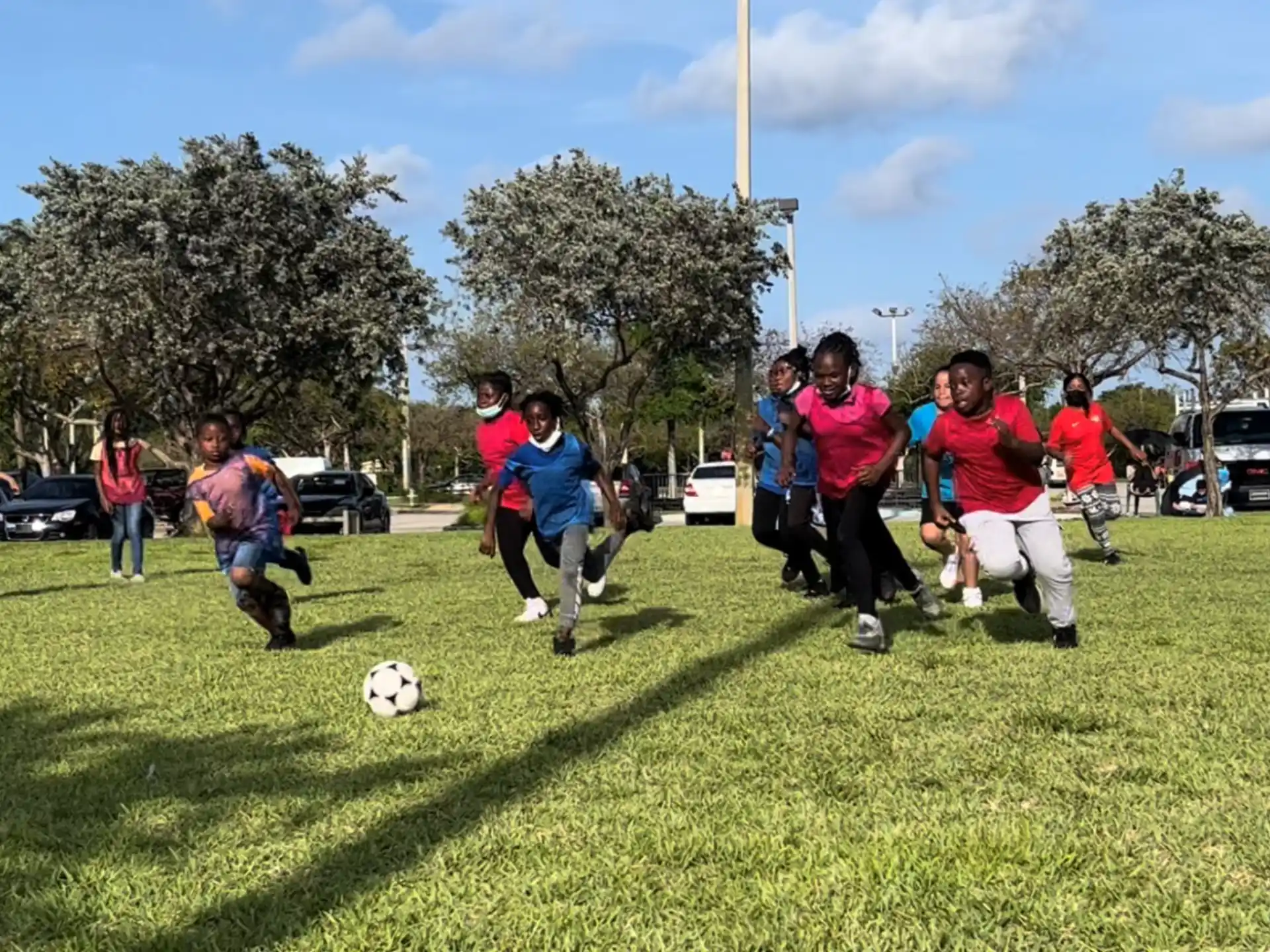 a group of people playing football