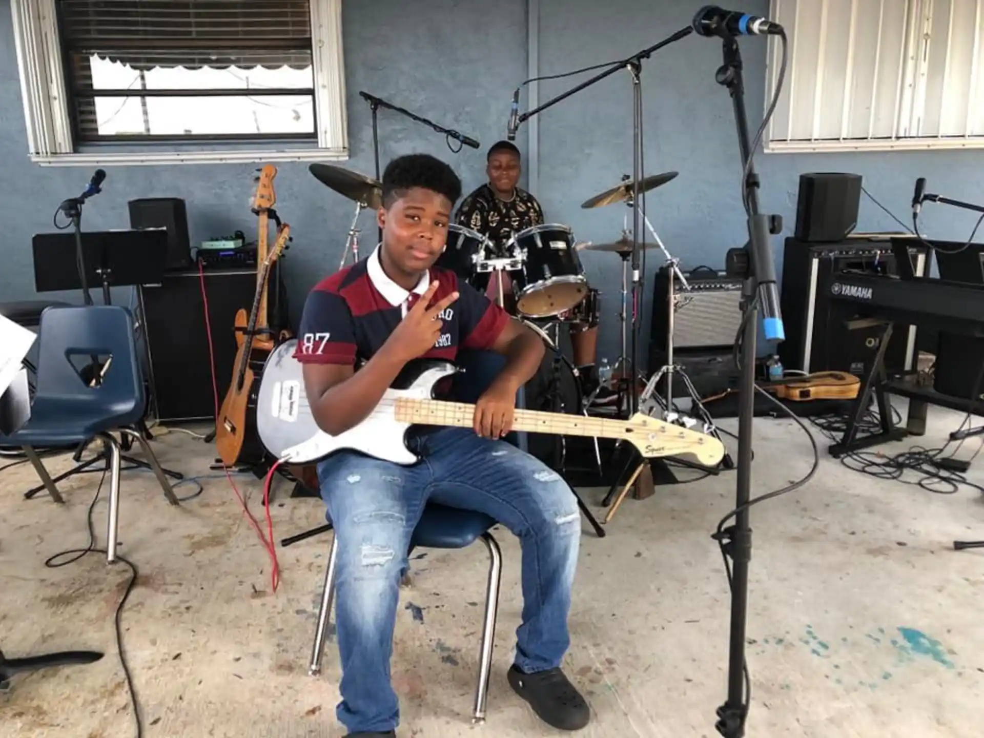 a person playing a guitar