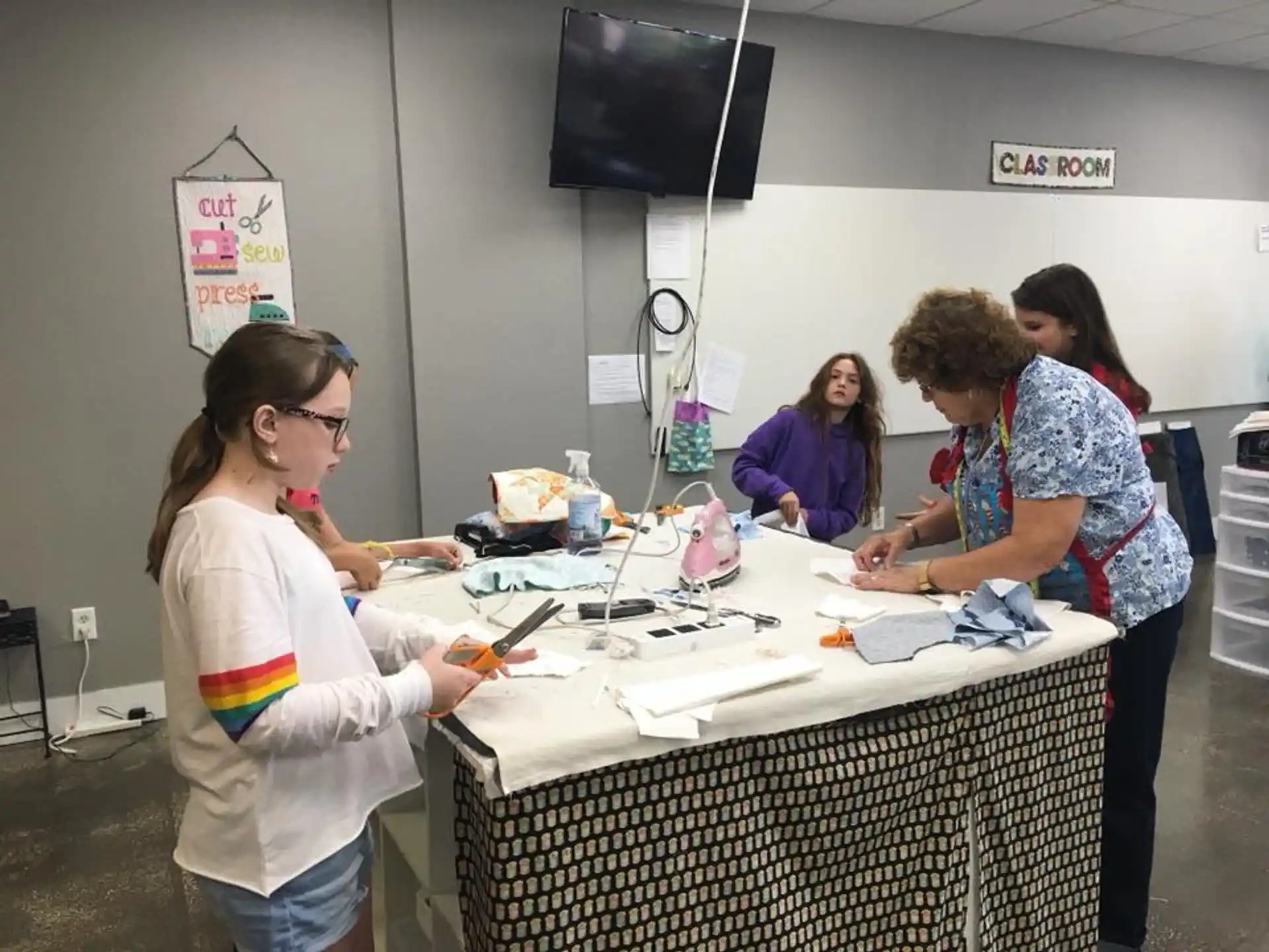 a group of women working at a table