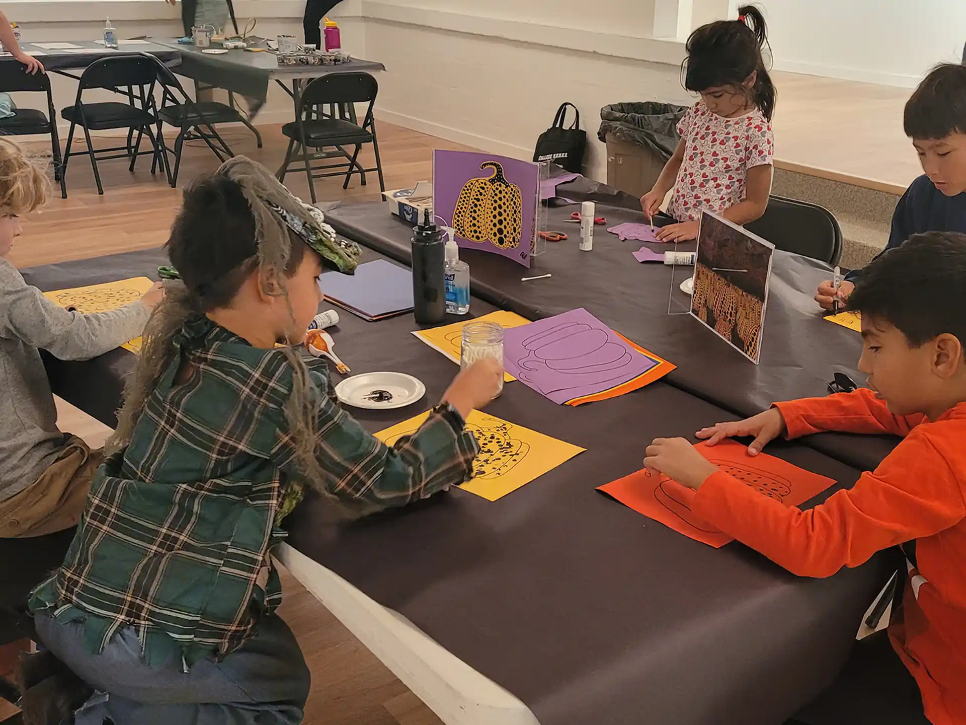 a group of people sitting around a table