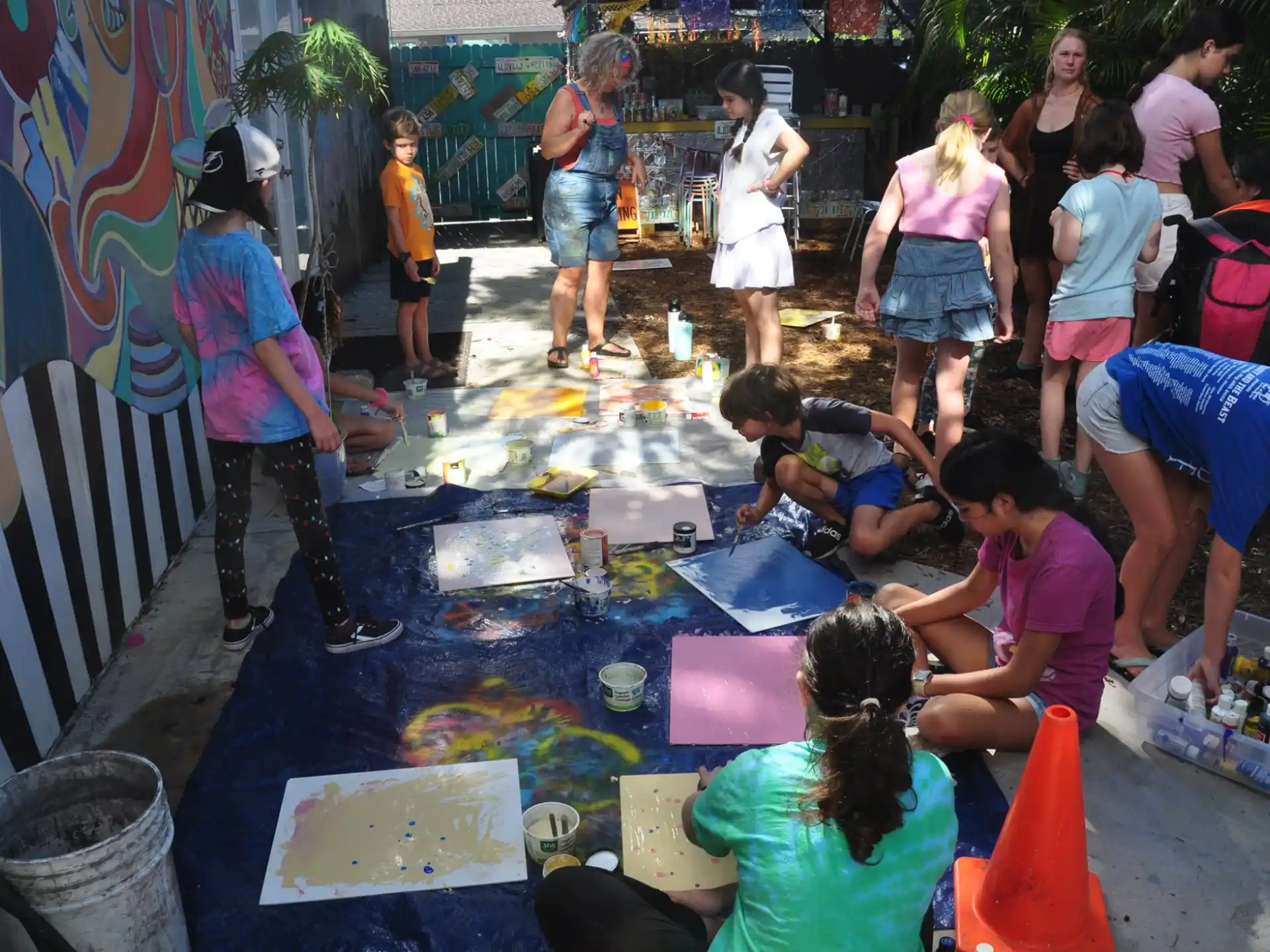 a group of people painting