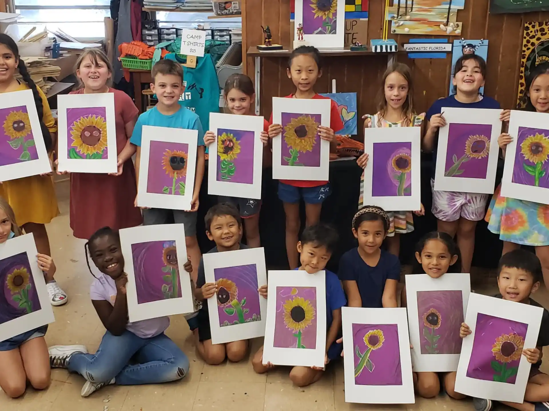 a group of children holding books