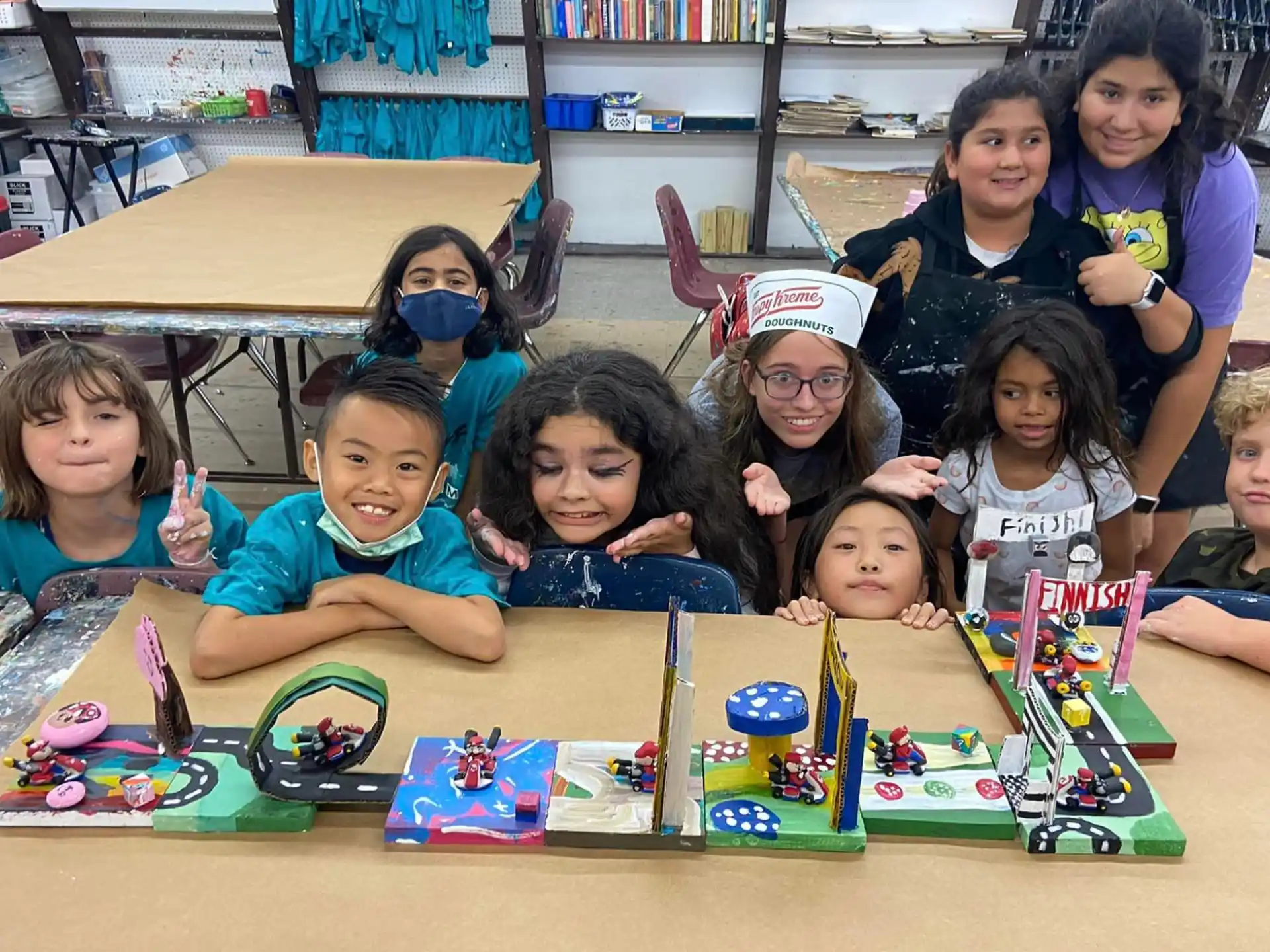 a group of children sitting on the floor with toys