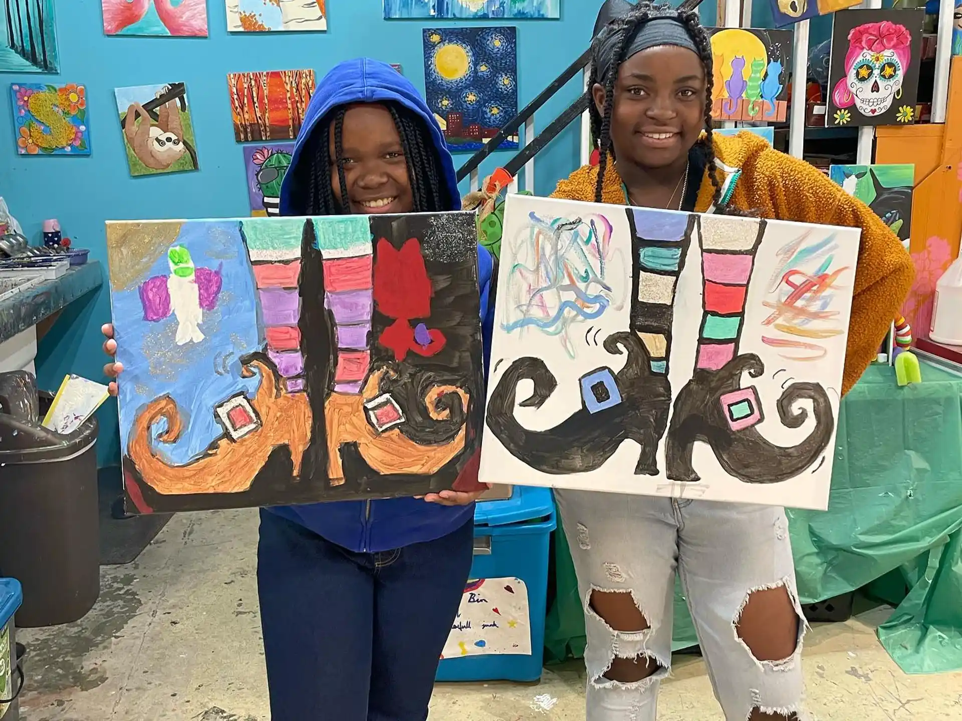 a couple of women holding signs