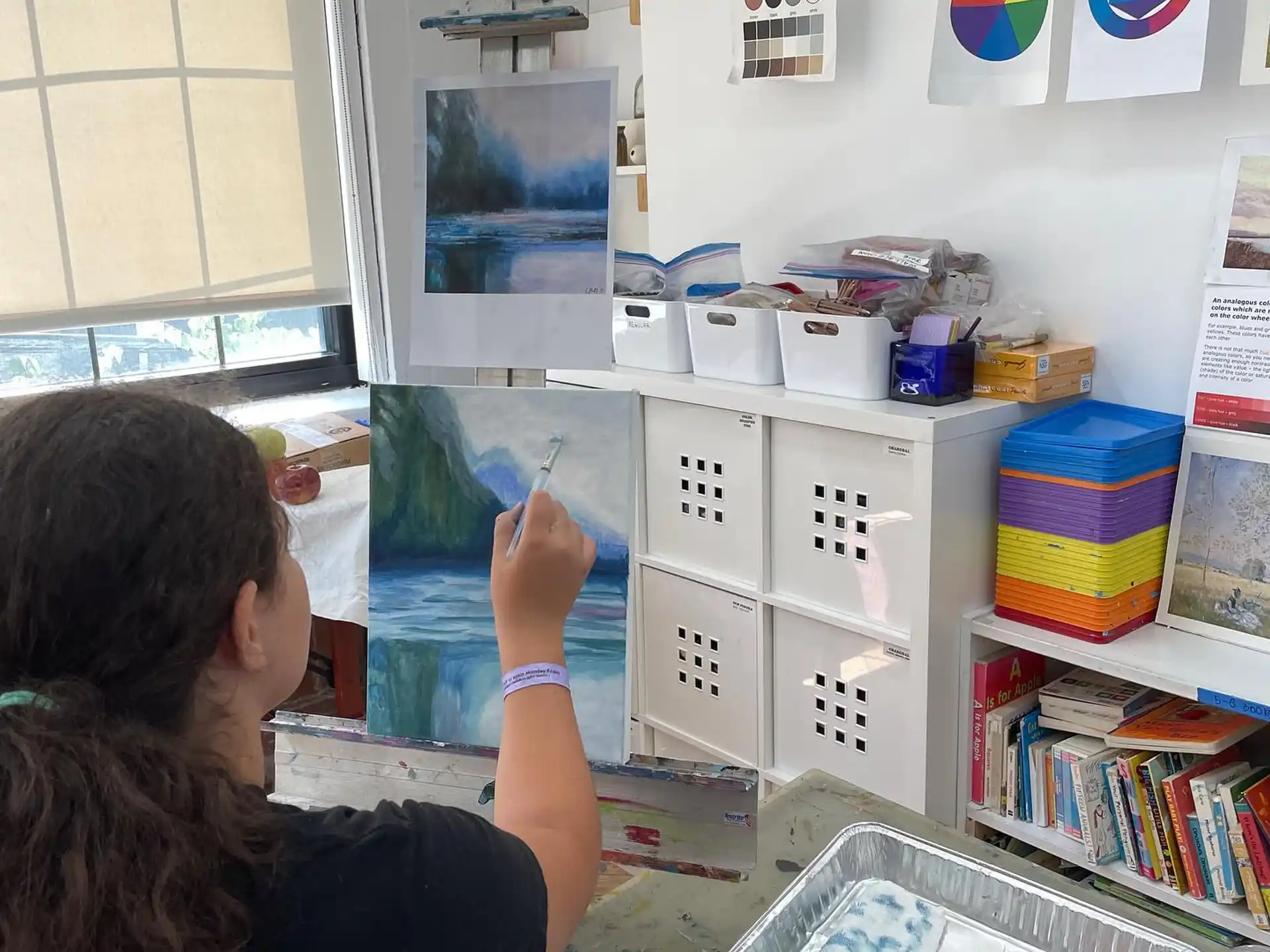 a person painting a room