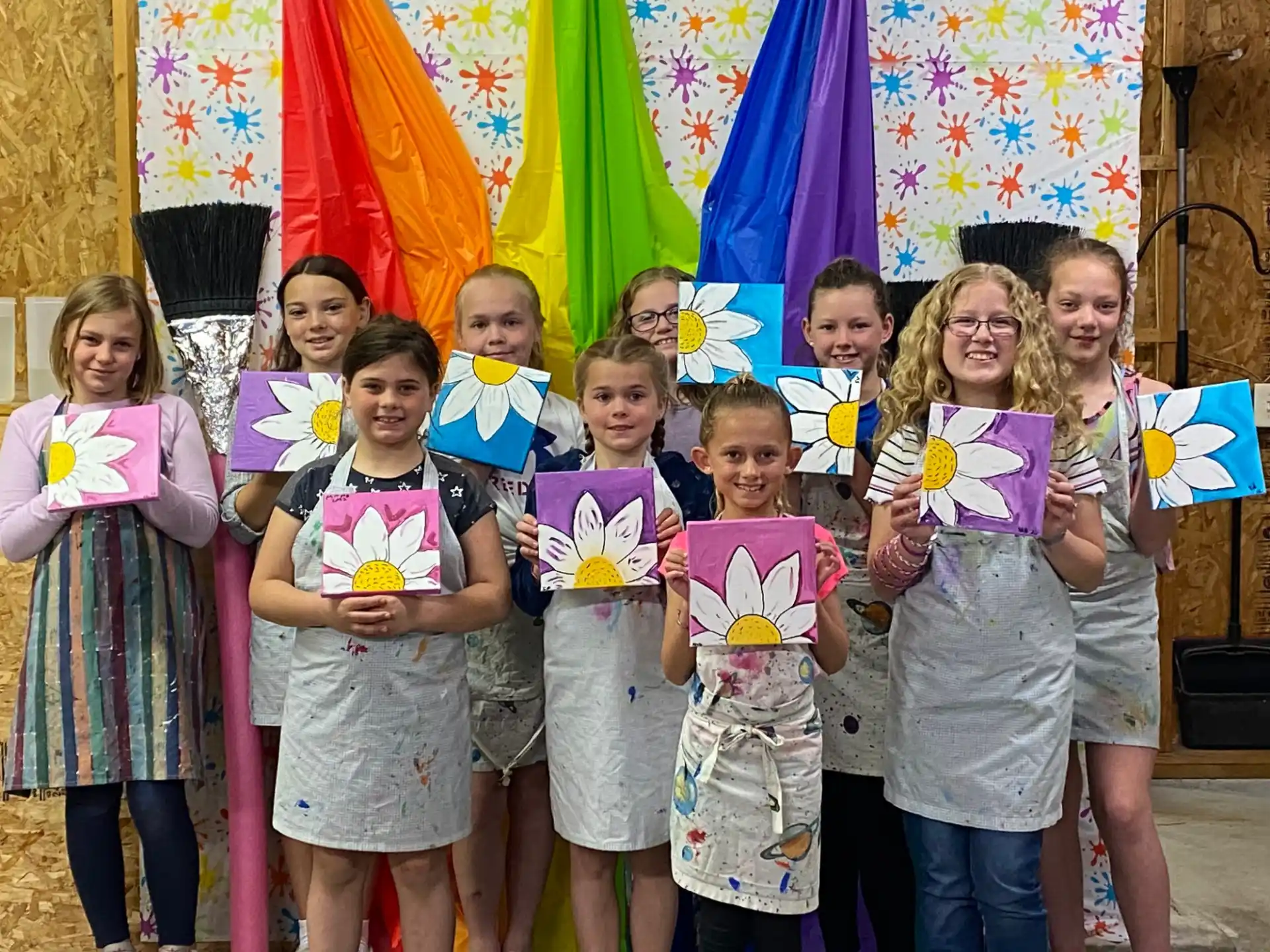 a group of children holding signs