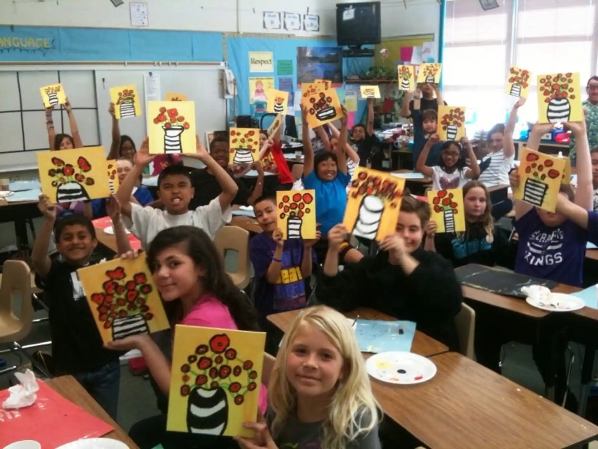 a group of children holding up signs