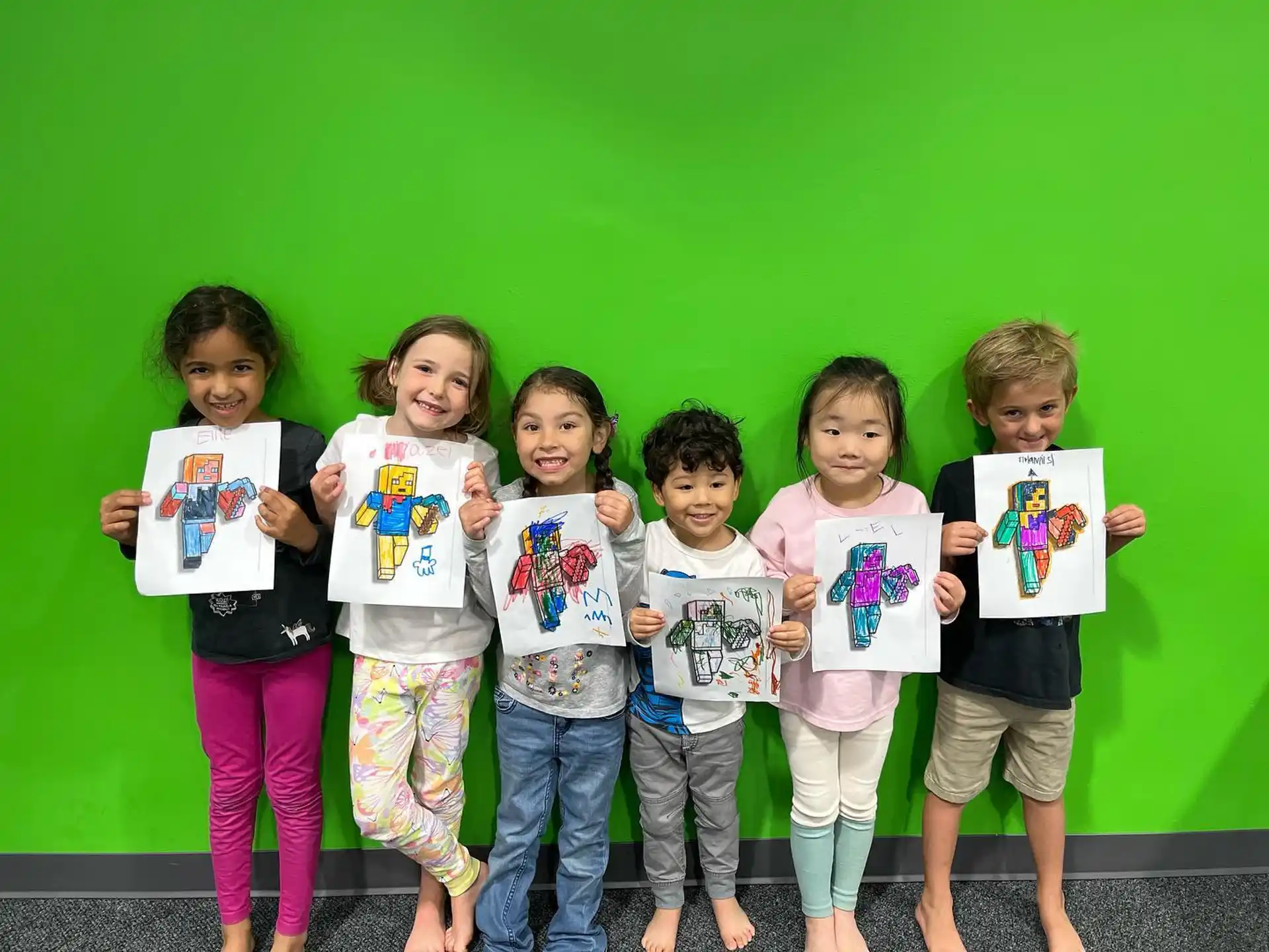 a group of children holding up signs
