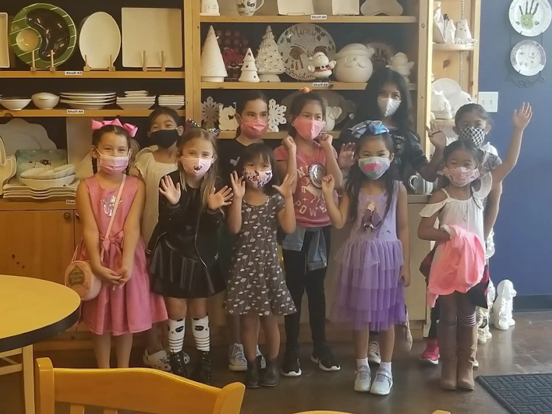 a group of girls posing for a photo