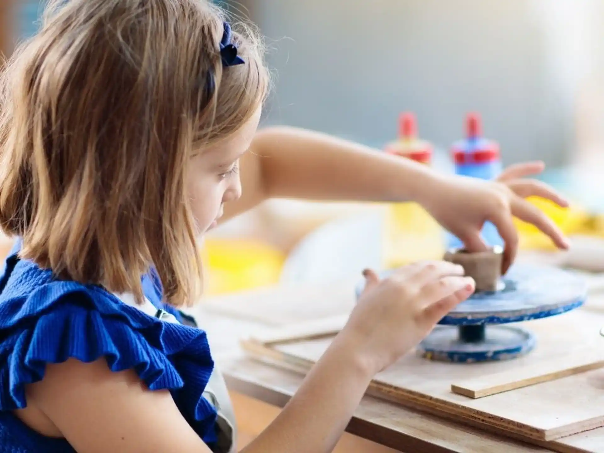 a young girl painting