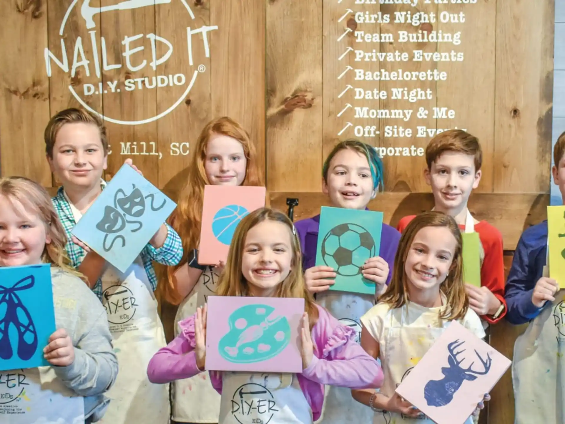 a group of children holding books