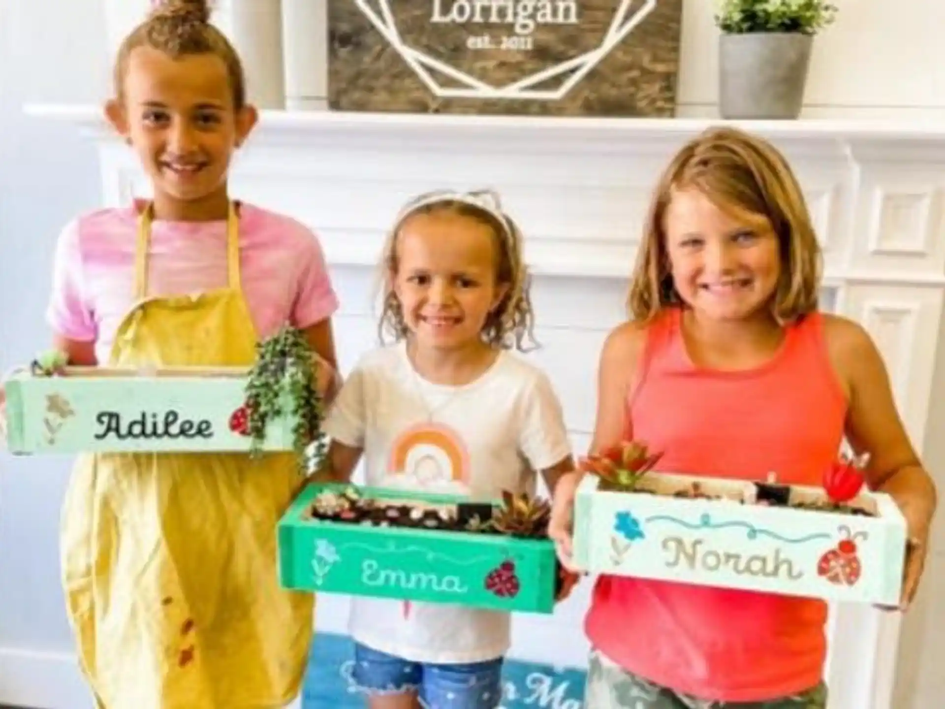a group of children holding boxes
