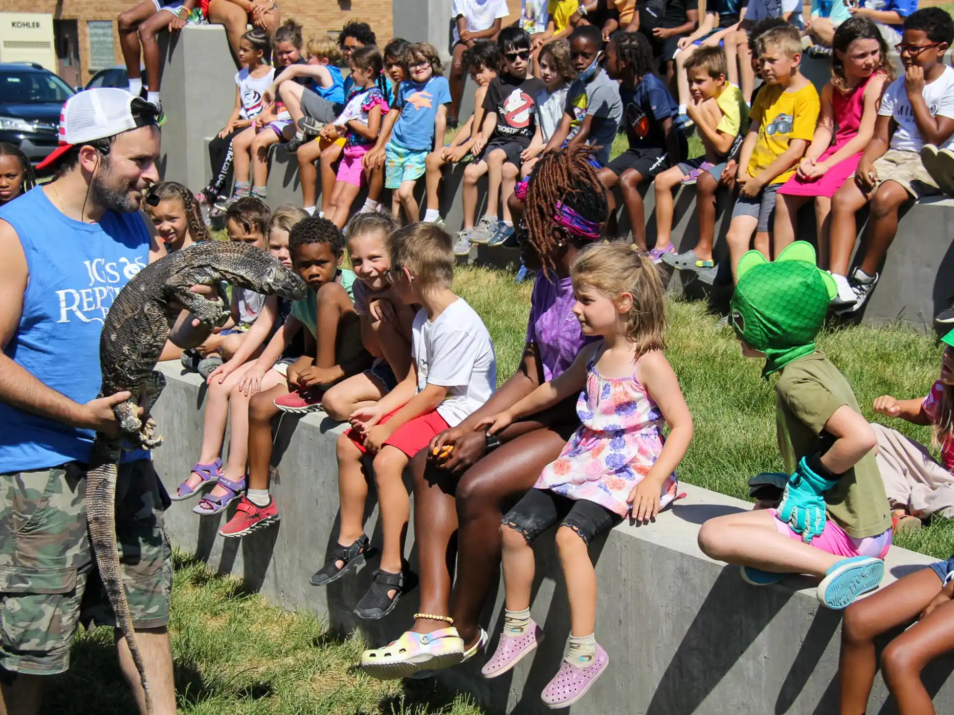 a group of people sitting on a bench