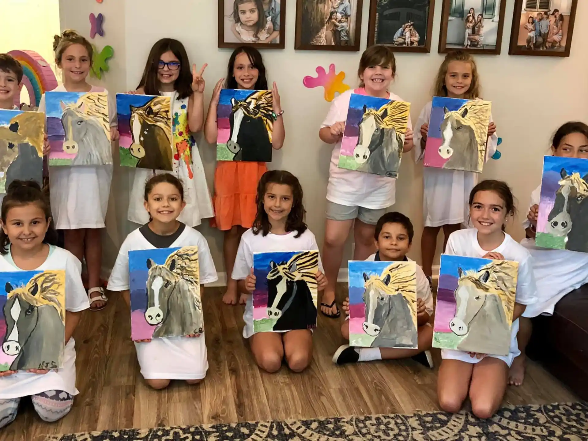 a group of children holding up posters