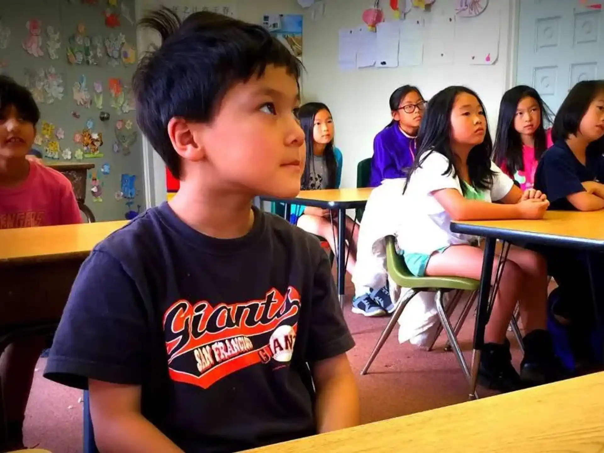a group of children in a classroom