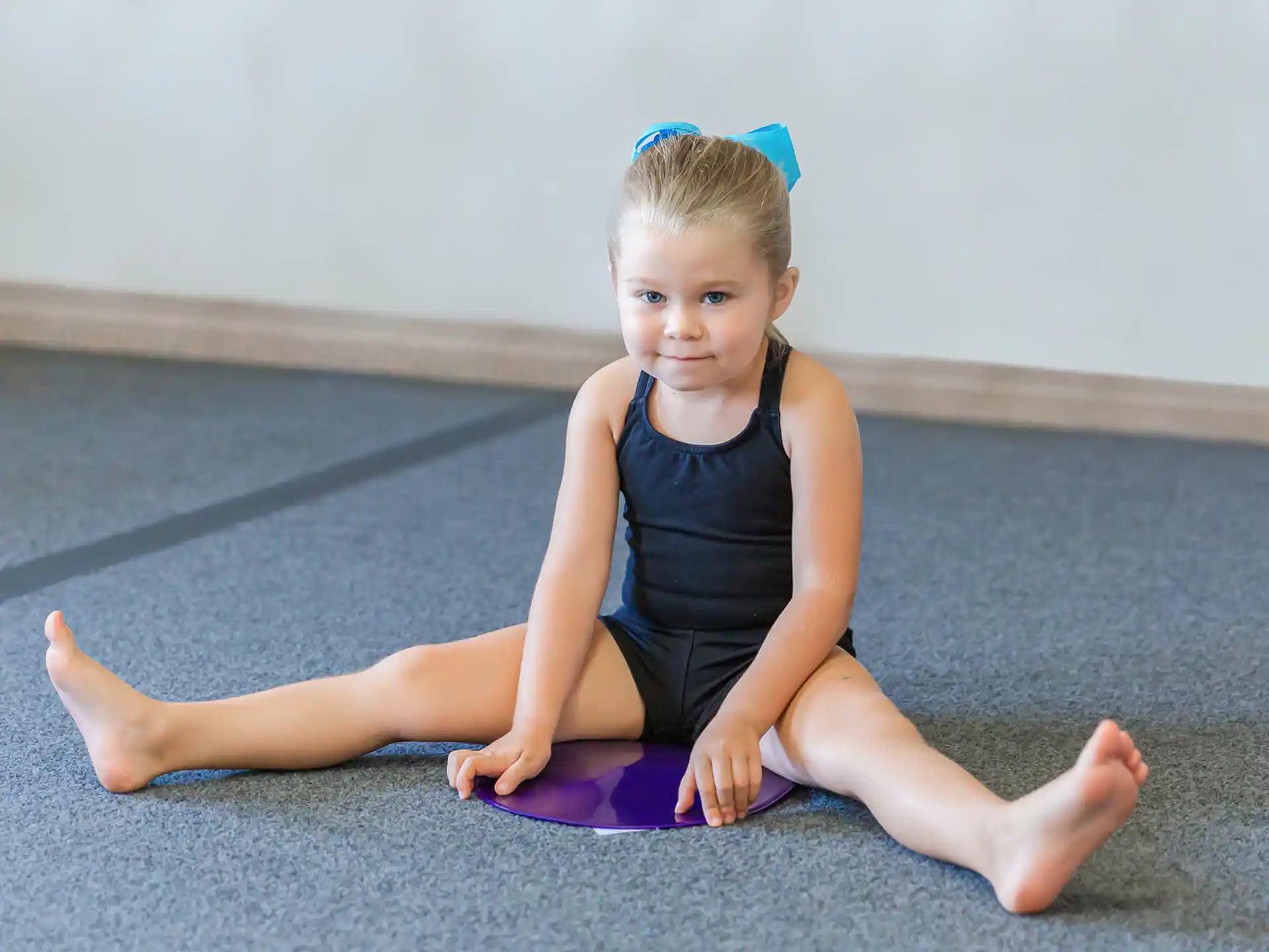 a girl sitting on the floor