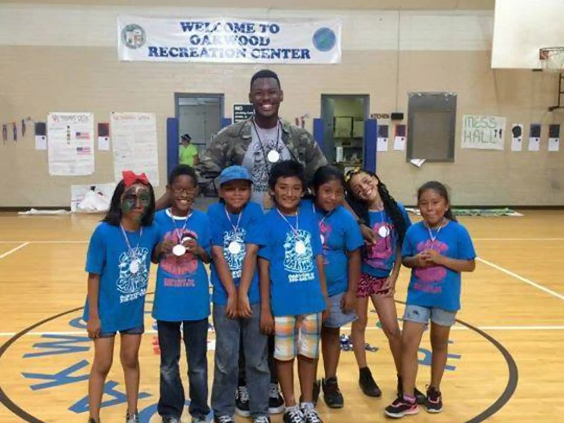 a group of kids posing for a photo