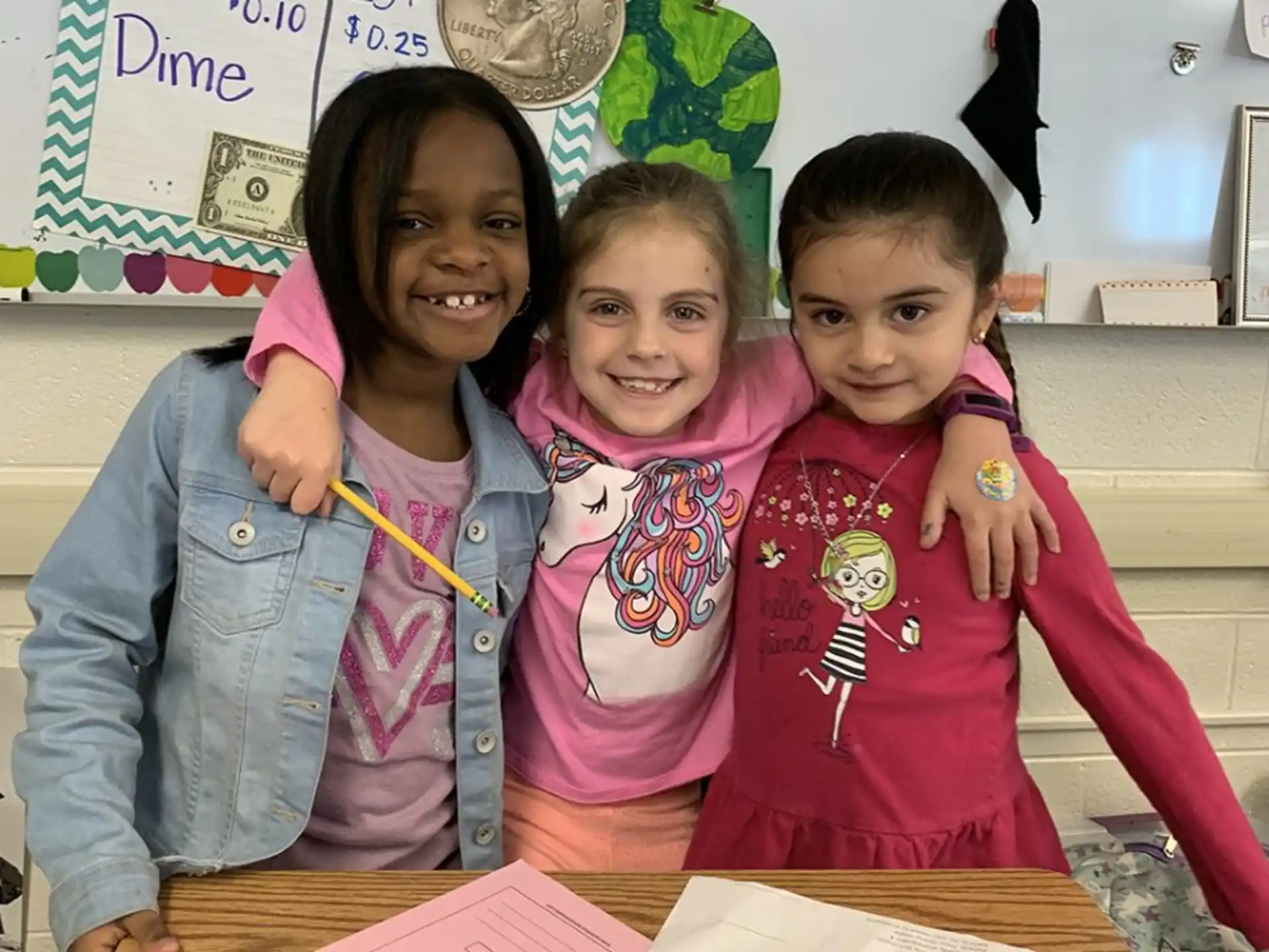 a group of girls posing for a photo
