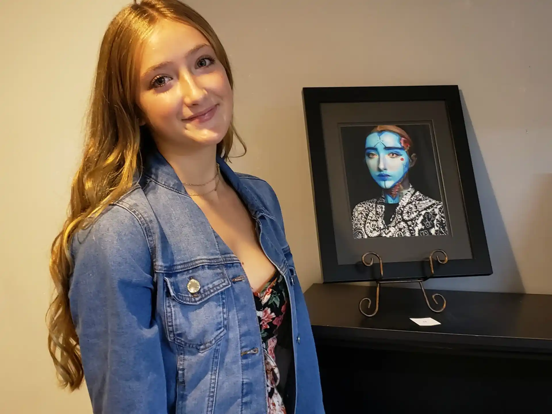a person standing in front of a television