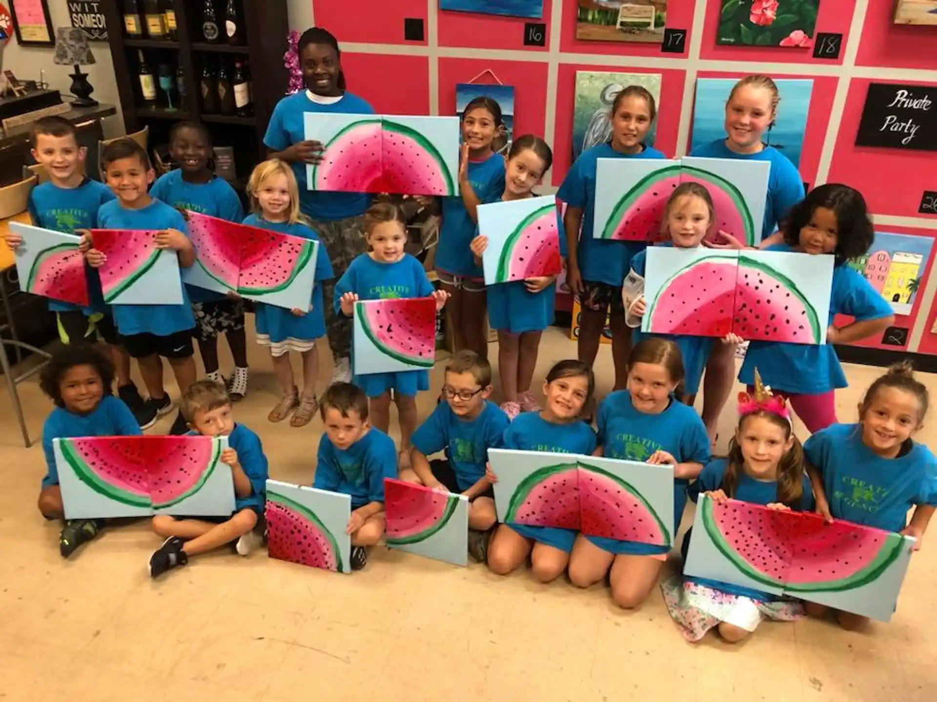 a group of children holding colorful umbrellas