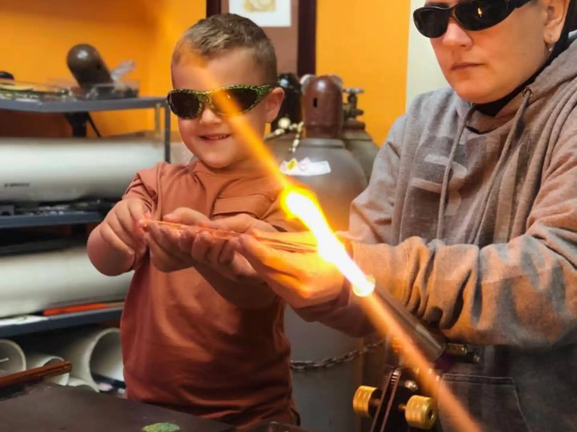 a man and a boy wearing sunglasses