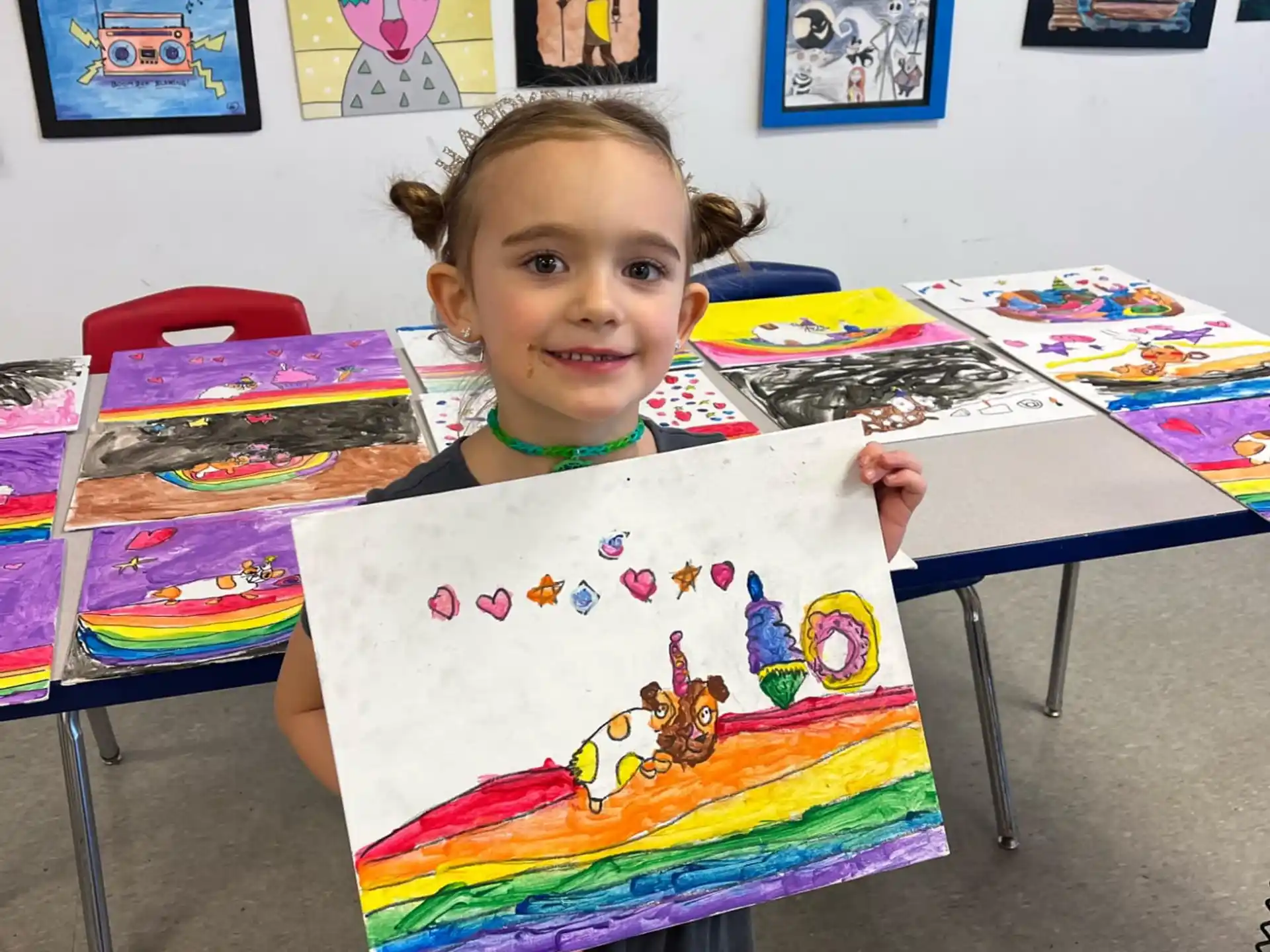 a child holding a piece of paper