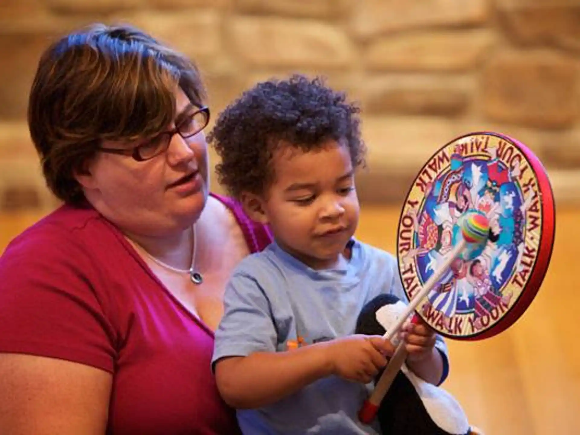 a person and a child painting