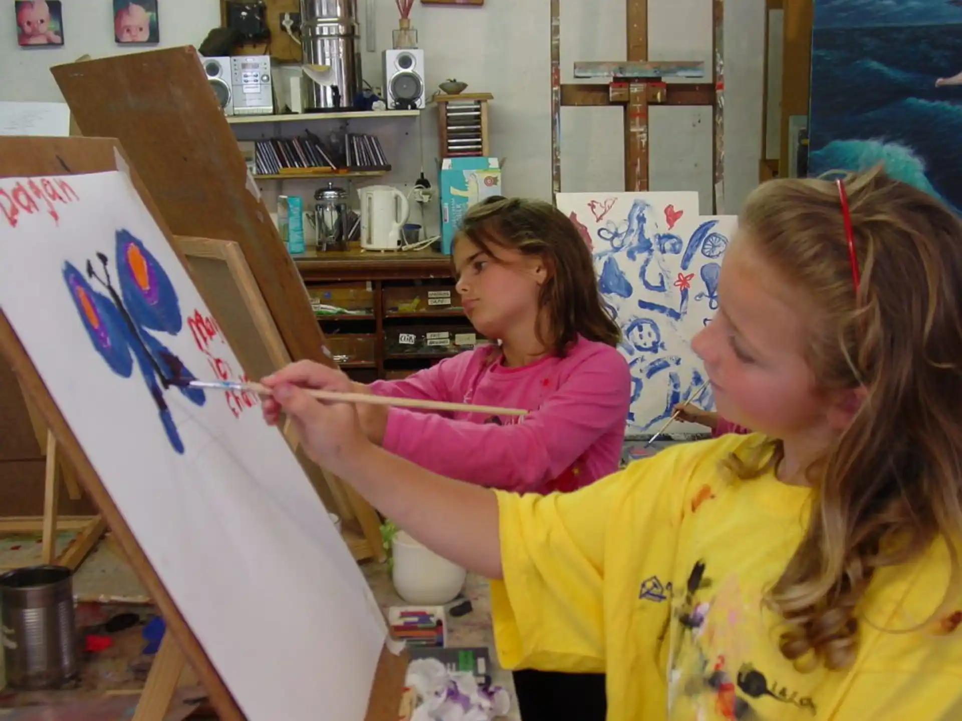 a young girl painting