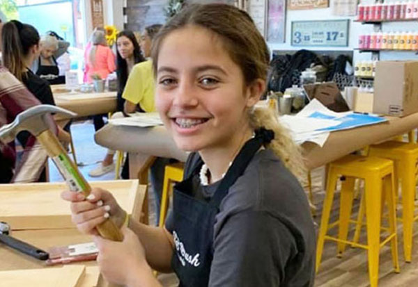 a girl smiling at the camera