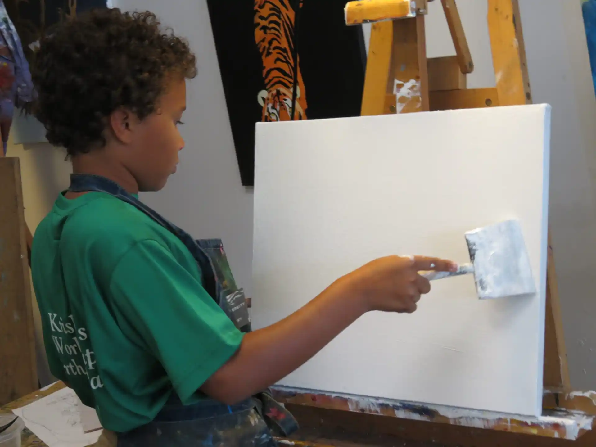a young boy painting