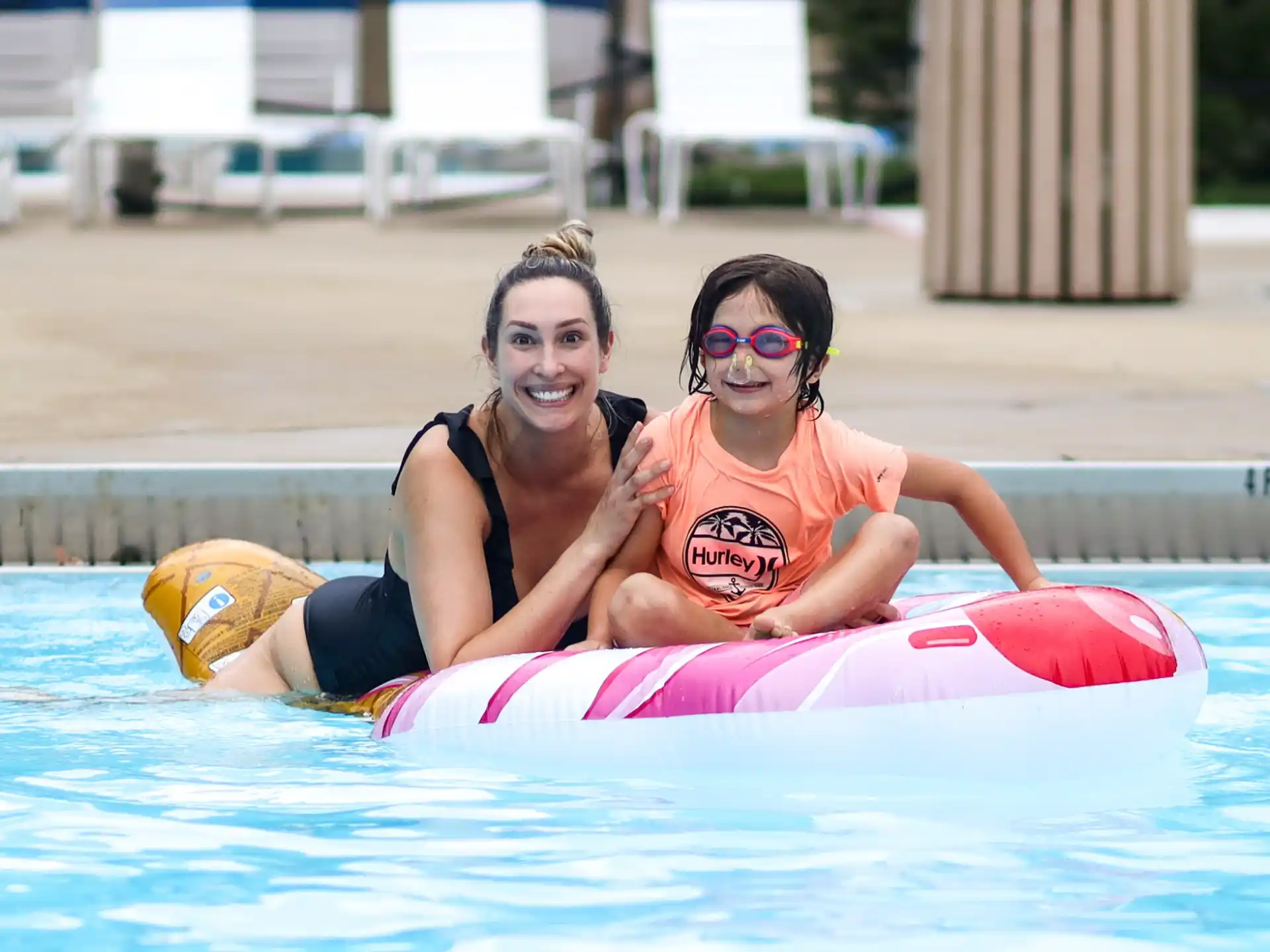 a couple of women in a pool