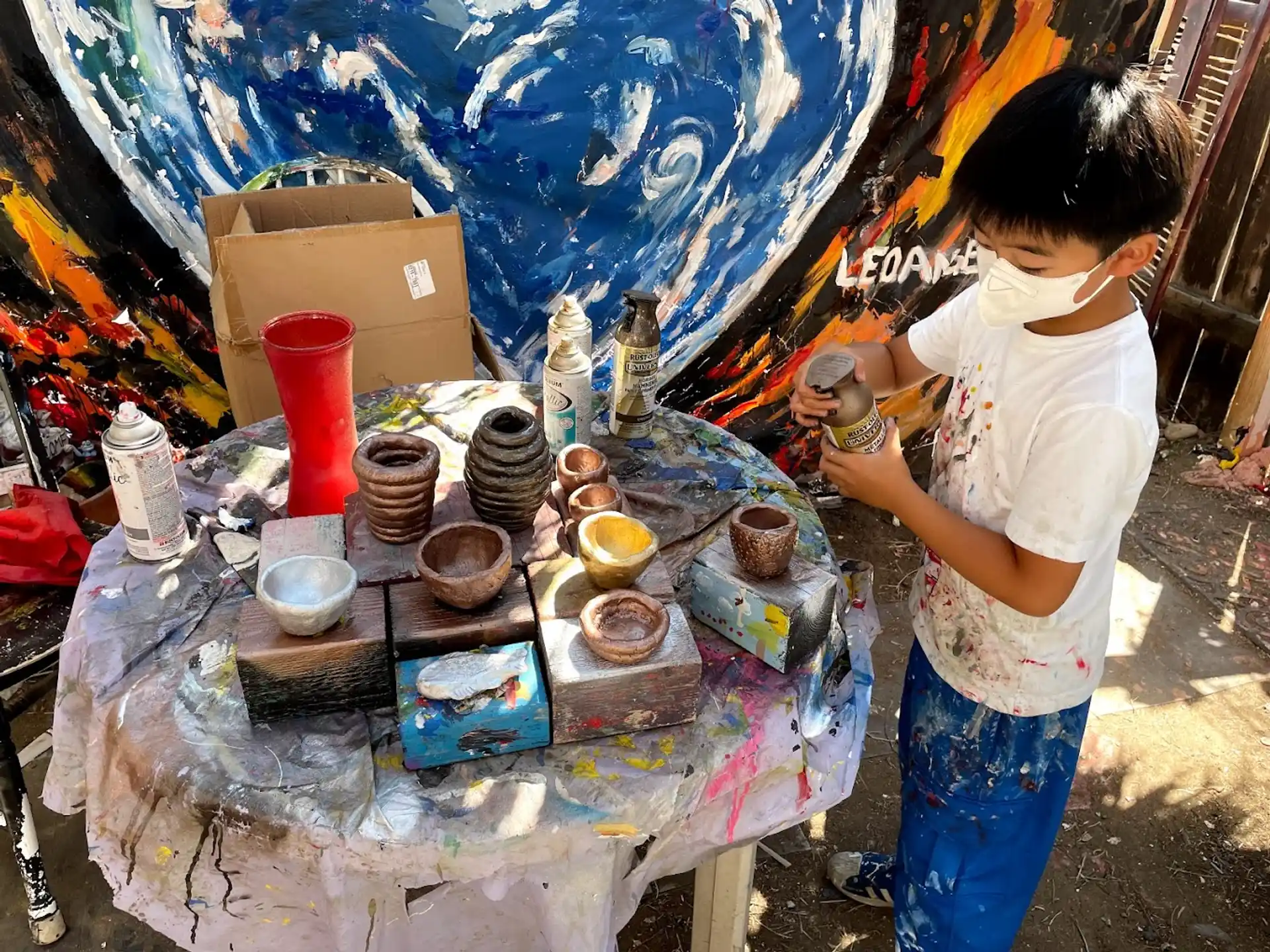 a person painting a table