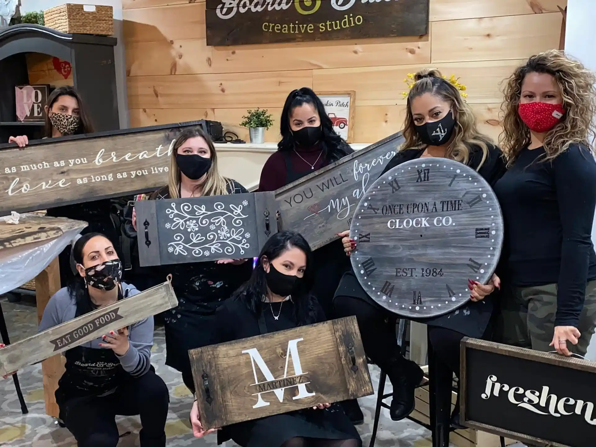 a group of people holding signs