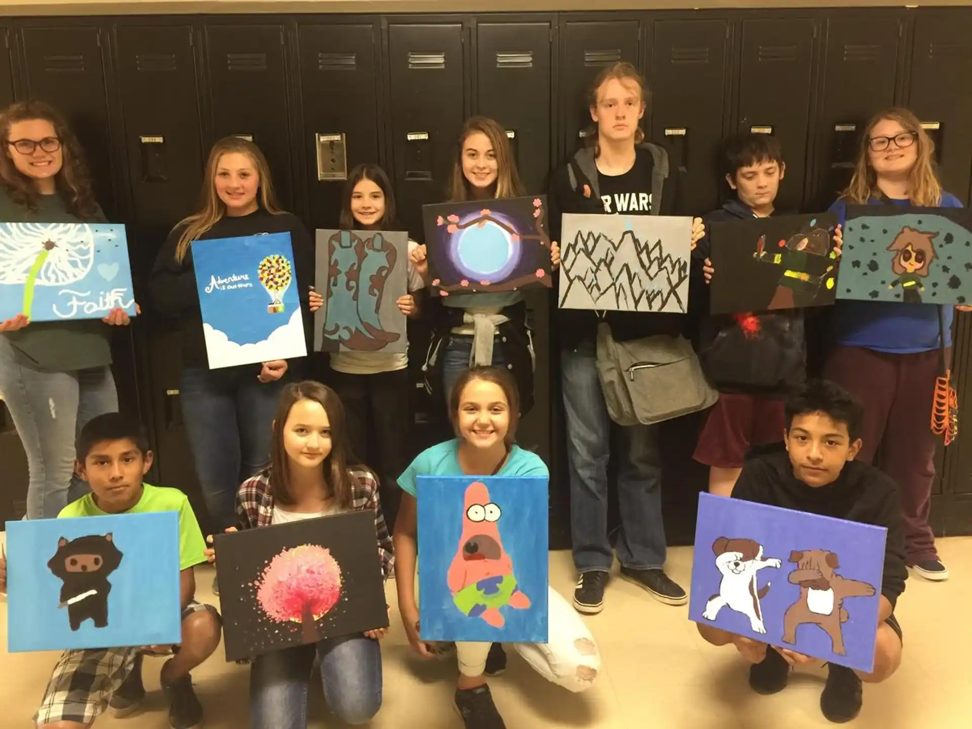 a group of children holding signs