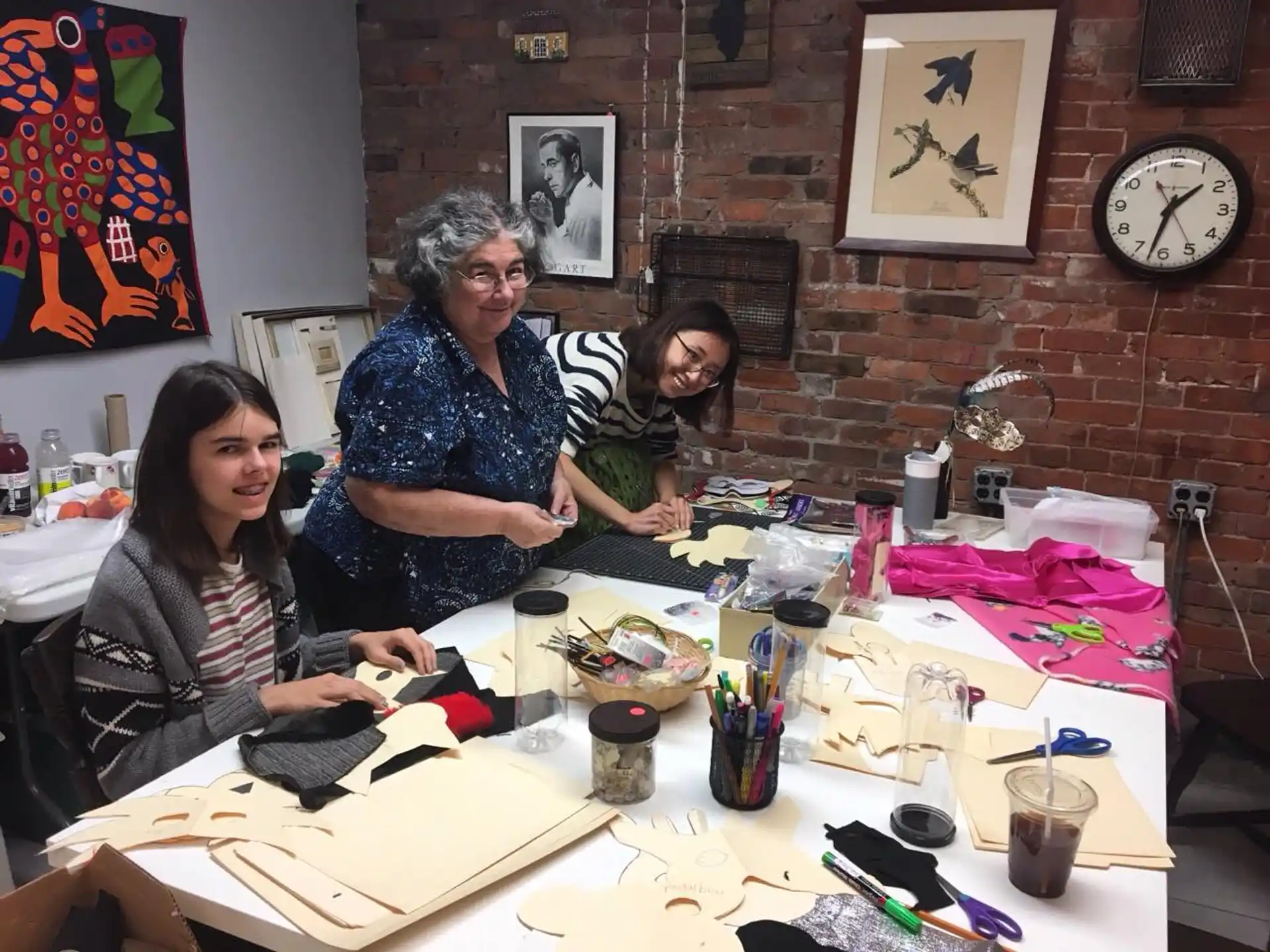 a group of women sitting at a table