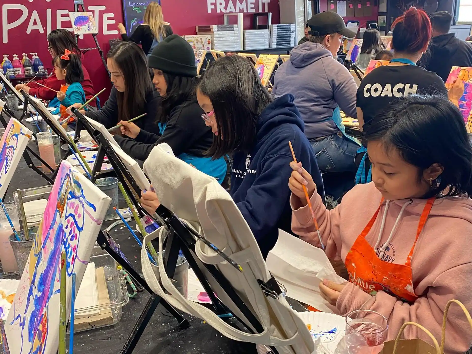 a group of people shopping at a store