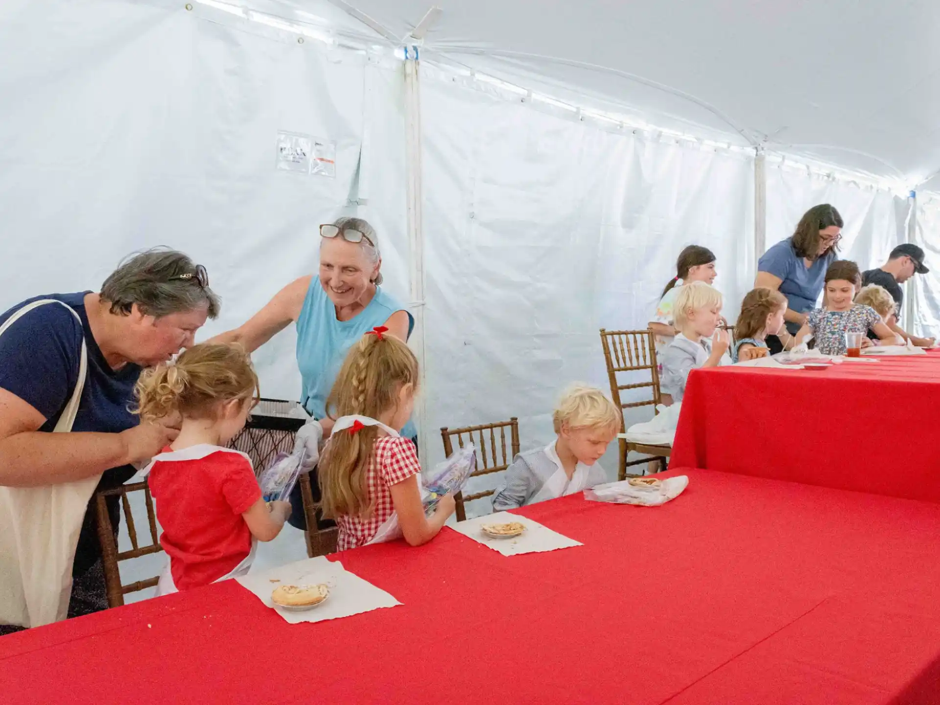 a group of people sitting at a table
