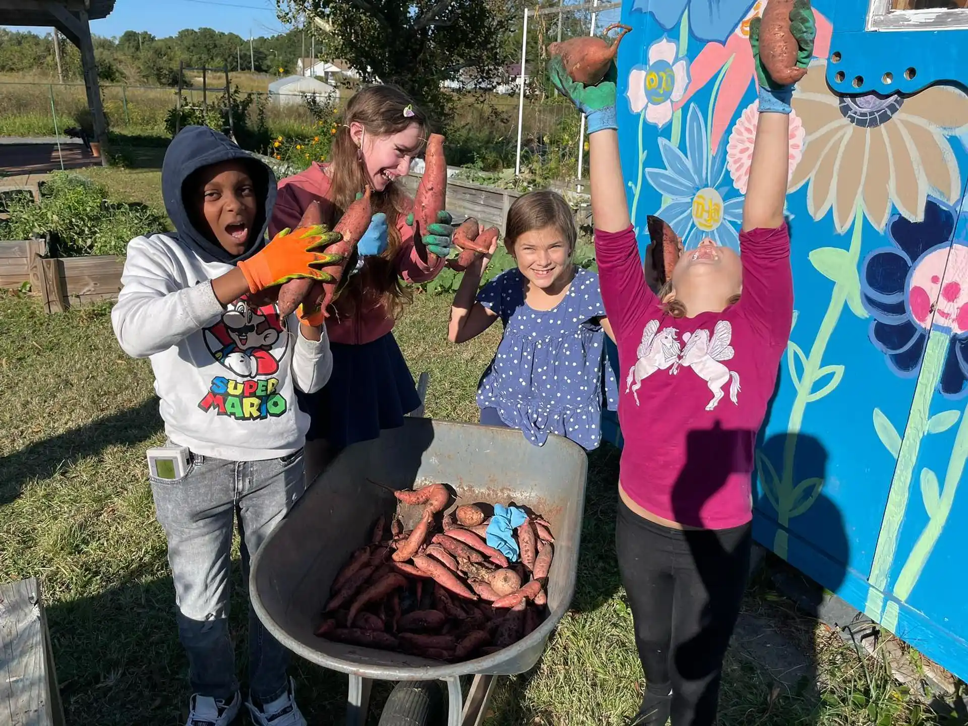 a group of children painting