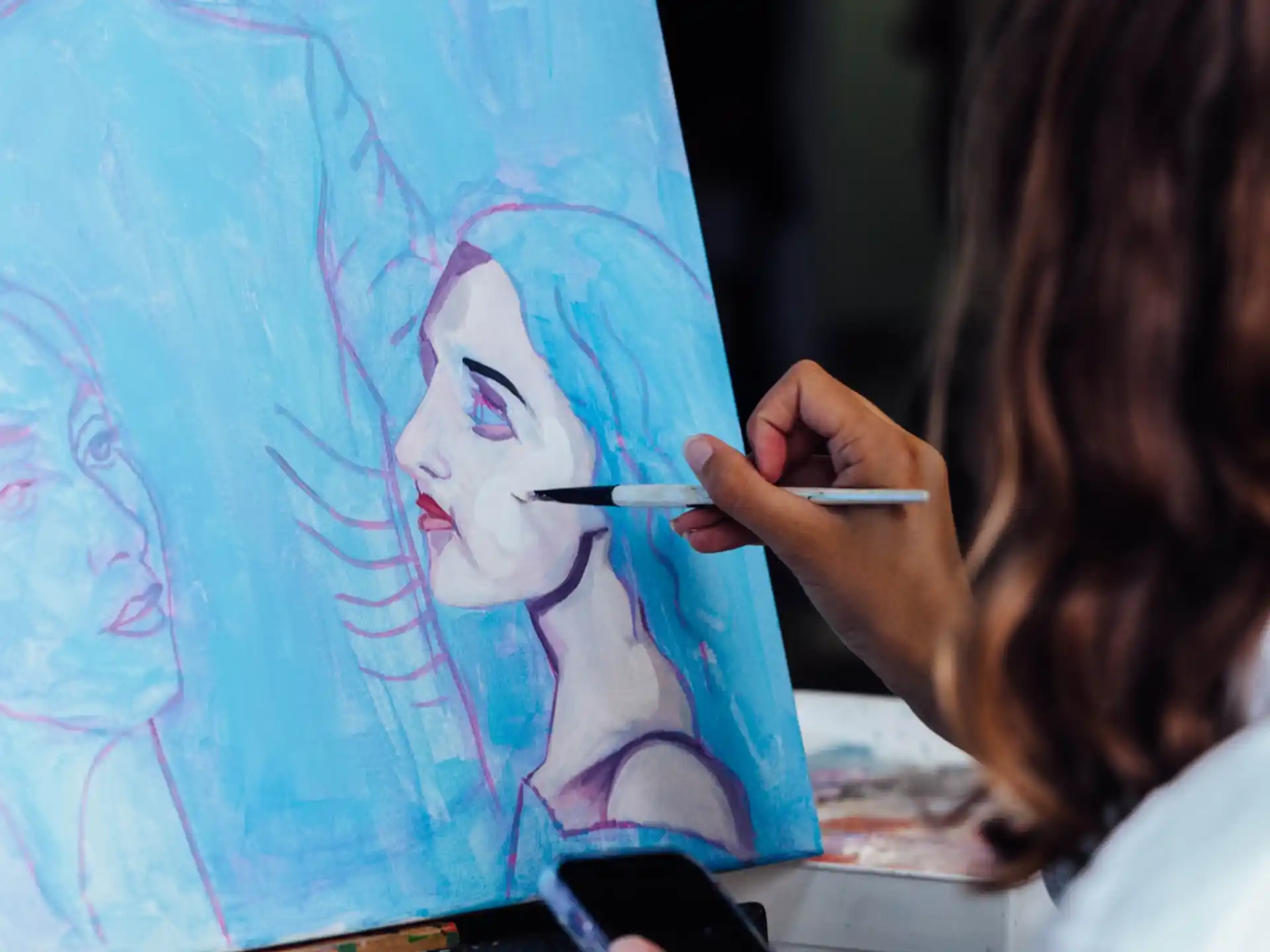 a person painting a picture
