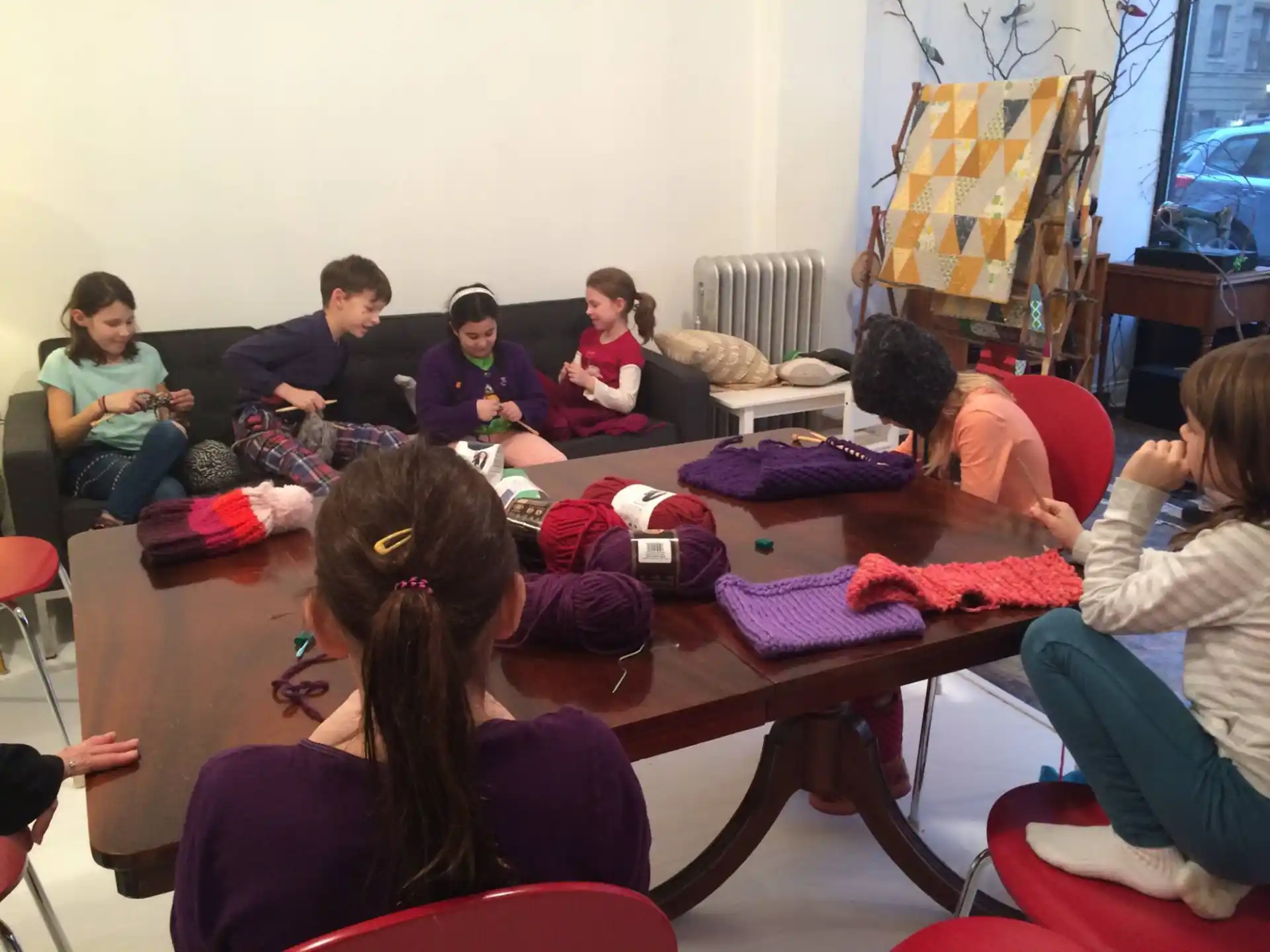 a group of people sitting around a table