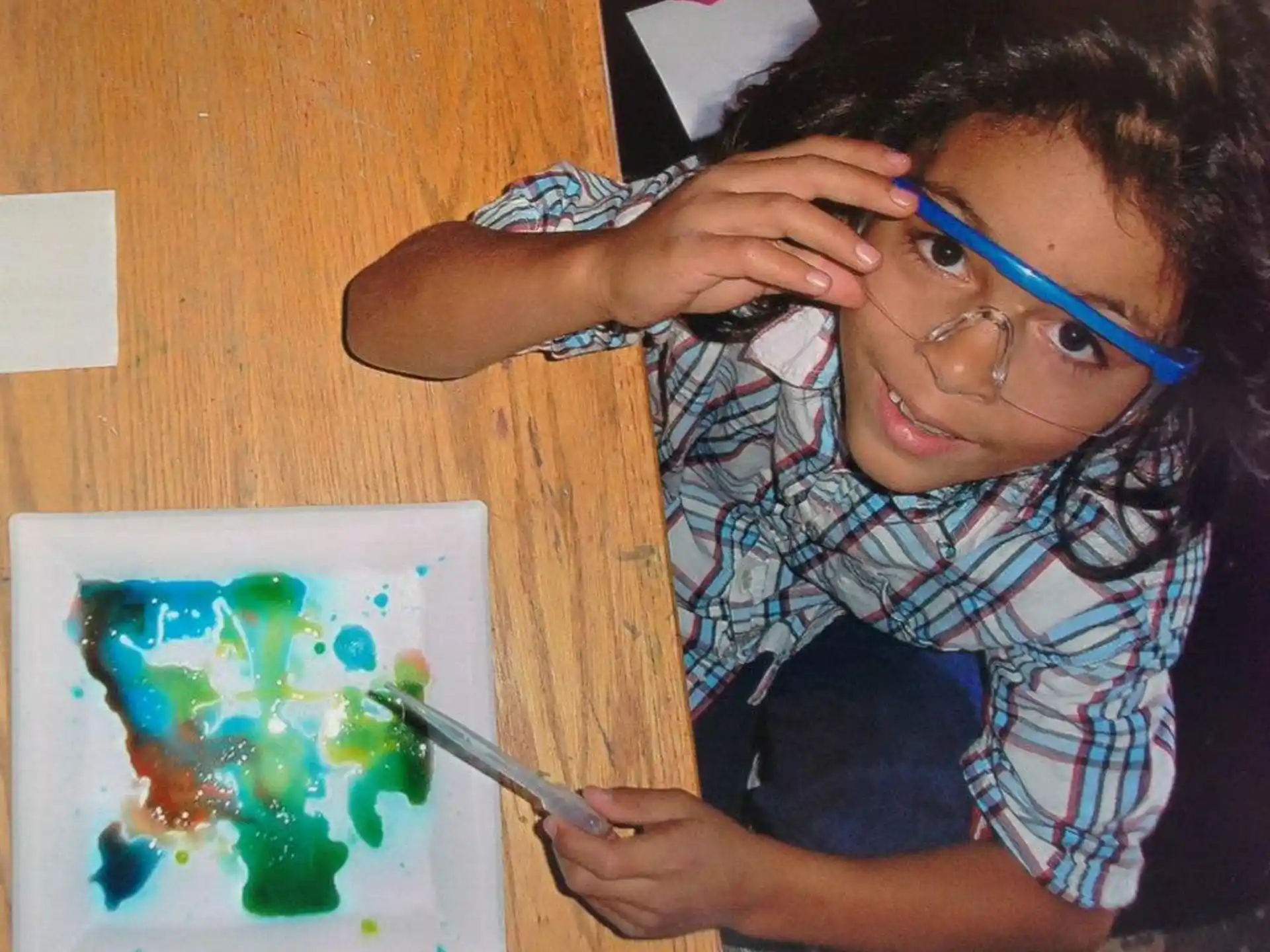 a young boy painting