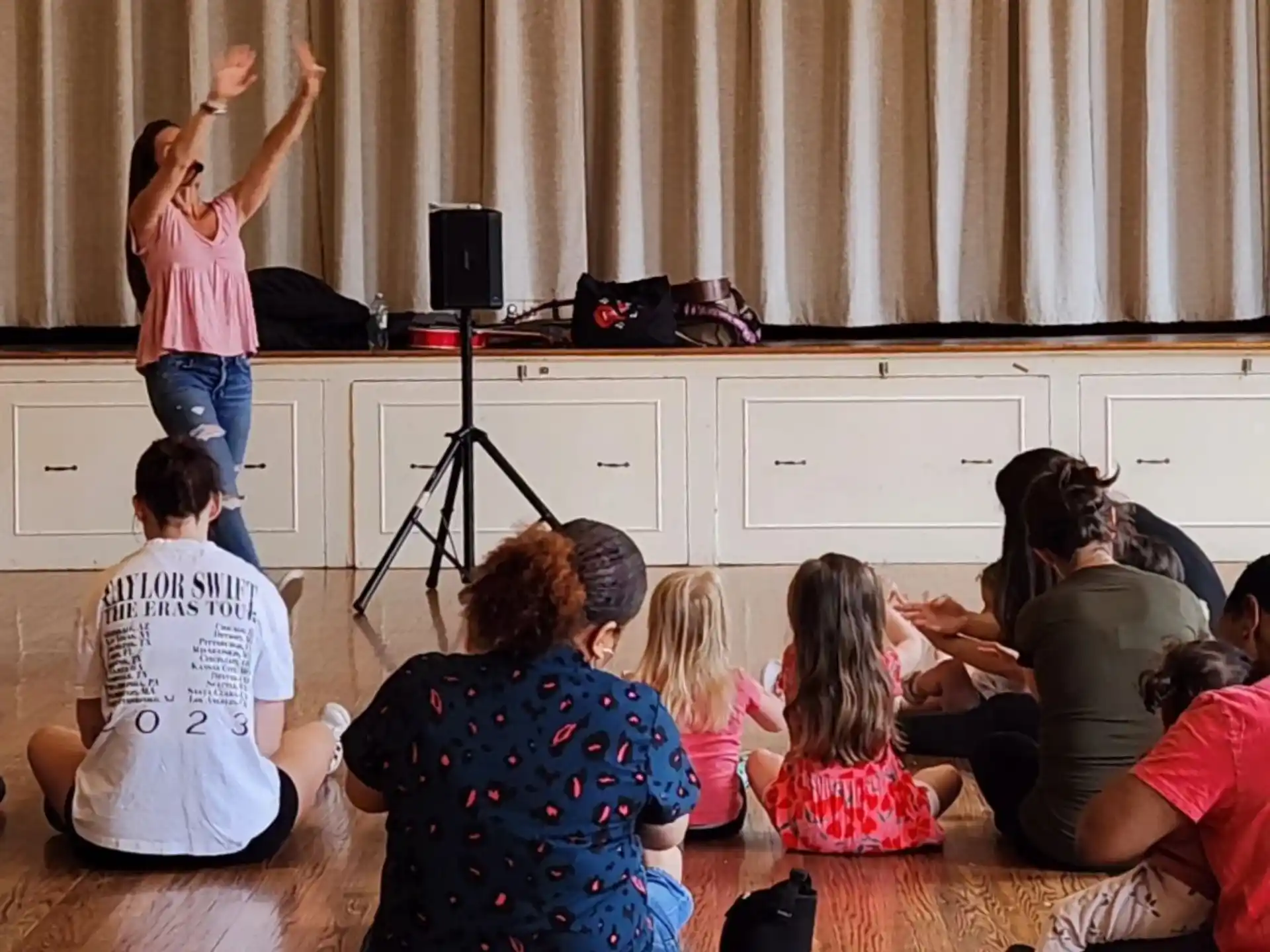 a person teaching a group of children