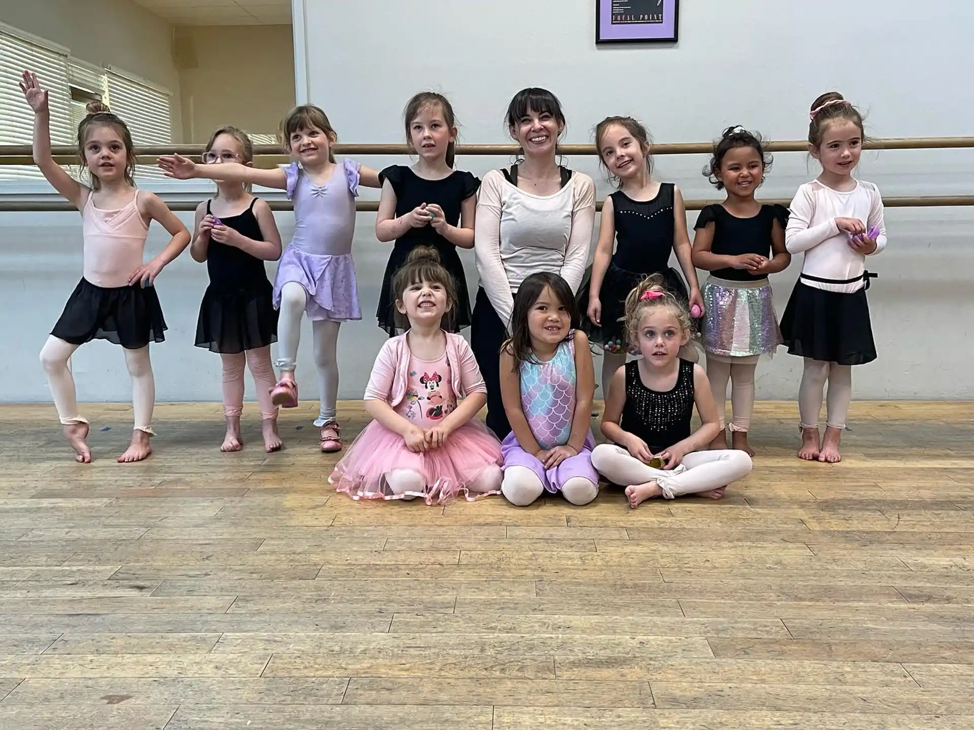 a group of girls posing for a photo