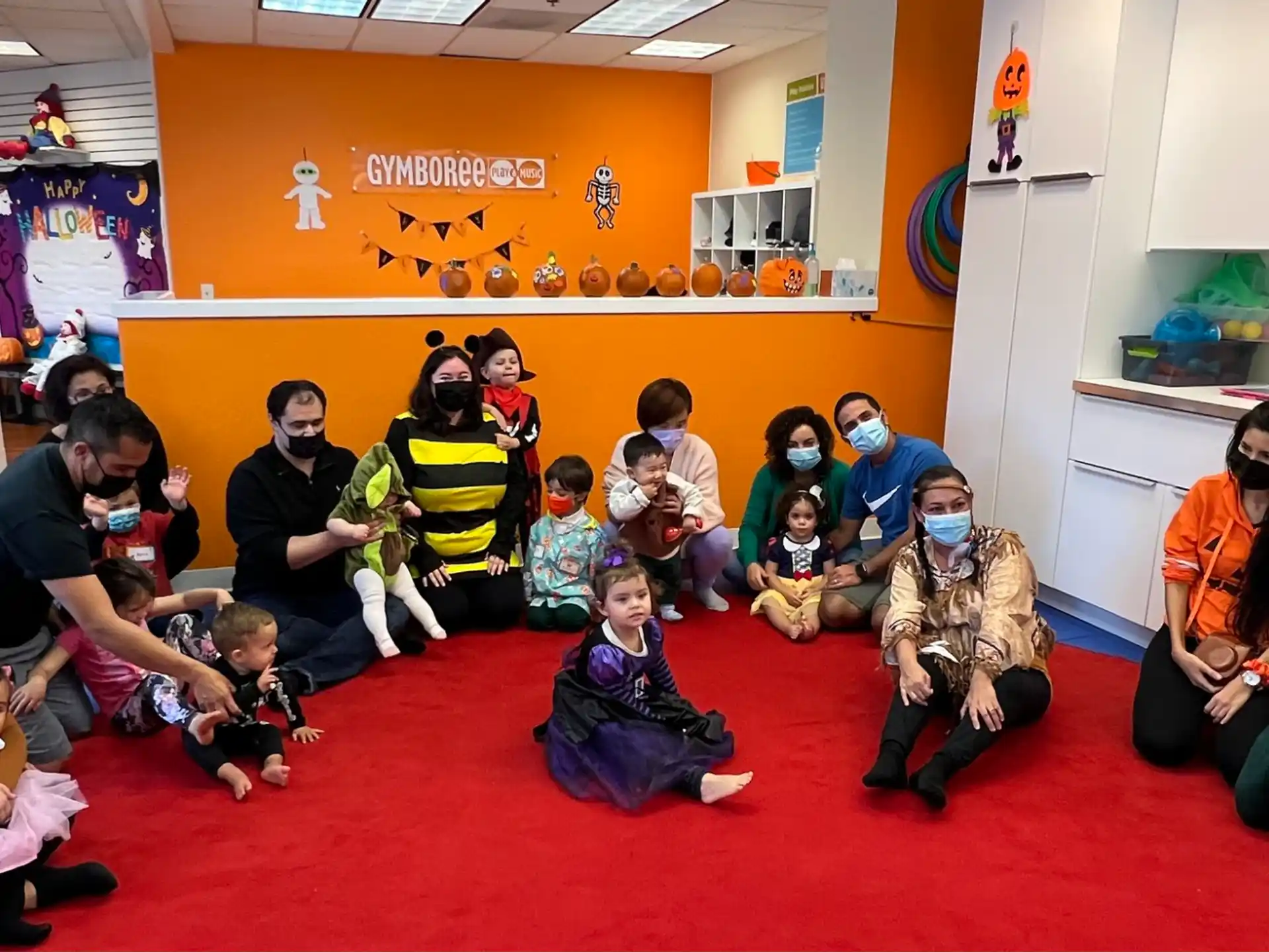 a group of people sitting on the floor